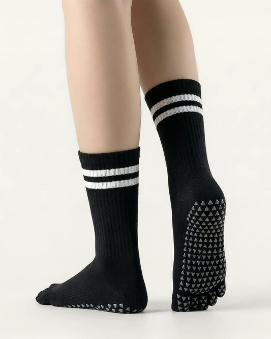 black | 02 | Black double-stripe five-toe grip socks back view showing sole grip pattern, stripe detail, and ribbed knit texture