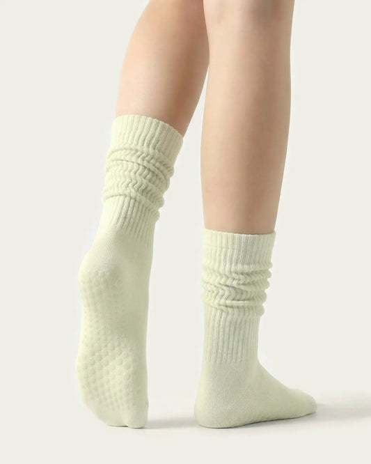 light-green | 02 | Light green slouch grip socks back side view showing slouch shape, grip sole detail, and soft ribbed texture