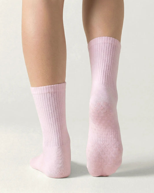 pink | 02 | Pink crew grip socks back view showing sole grip pattern and ribbed knit texture