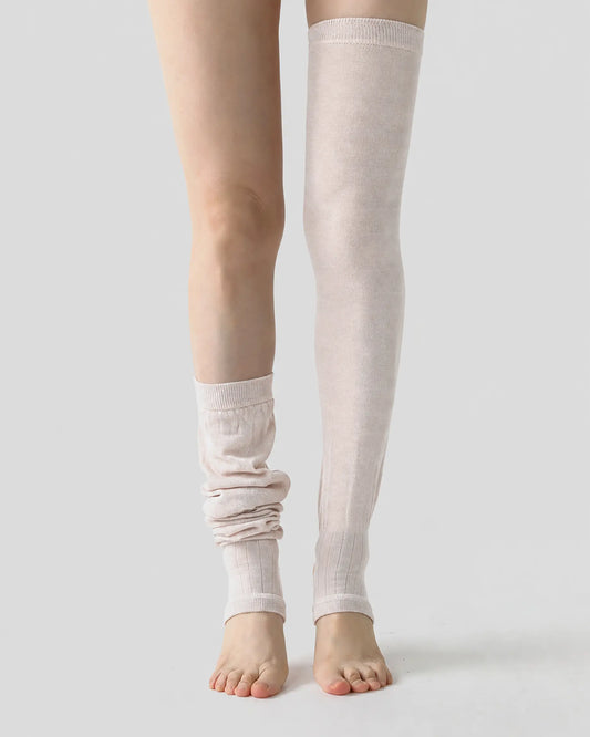 apricot | 02 | Apricot ballet stirrup leg warmers styling comparison showing one leg worn fully extended and the other softly scrunched
