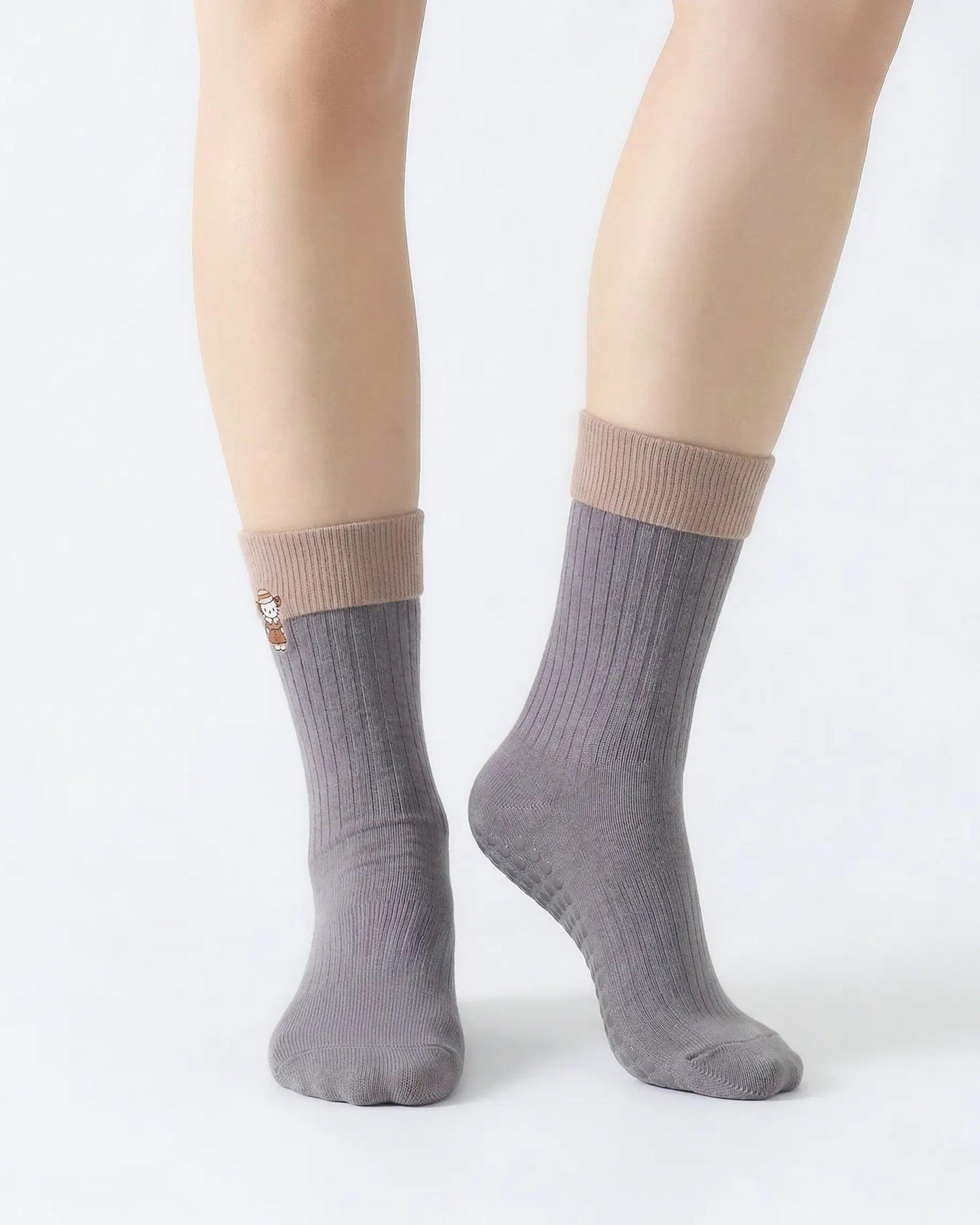 light-grey | 04 | Light grey character embroidery crew grip socks front standing view showing contrast cuff, ribbed knit texture, and clean non-slip crew sock shape