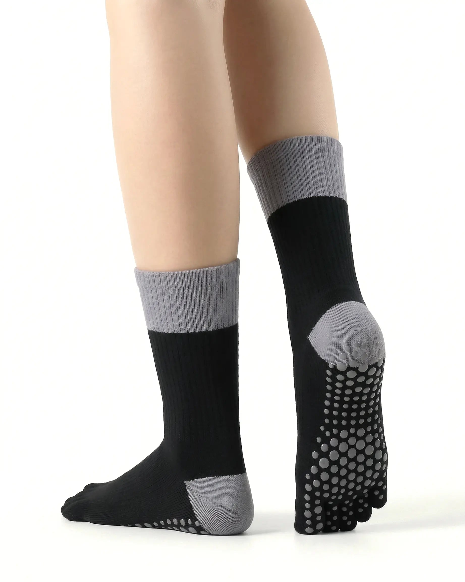 black | 02 | Black color block five-toe grip socks back side view showing full-sole grip texture, five-toe separation, and contrast color blocking
