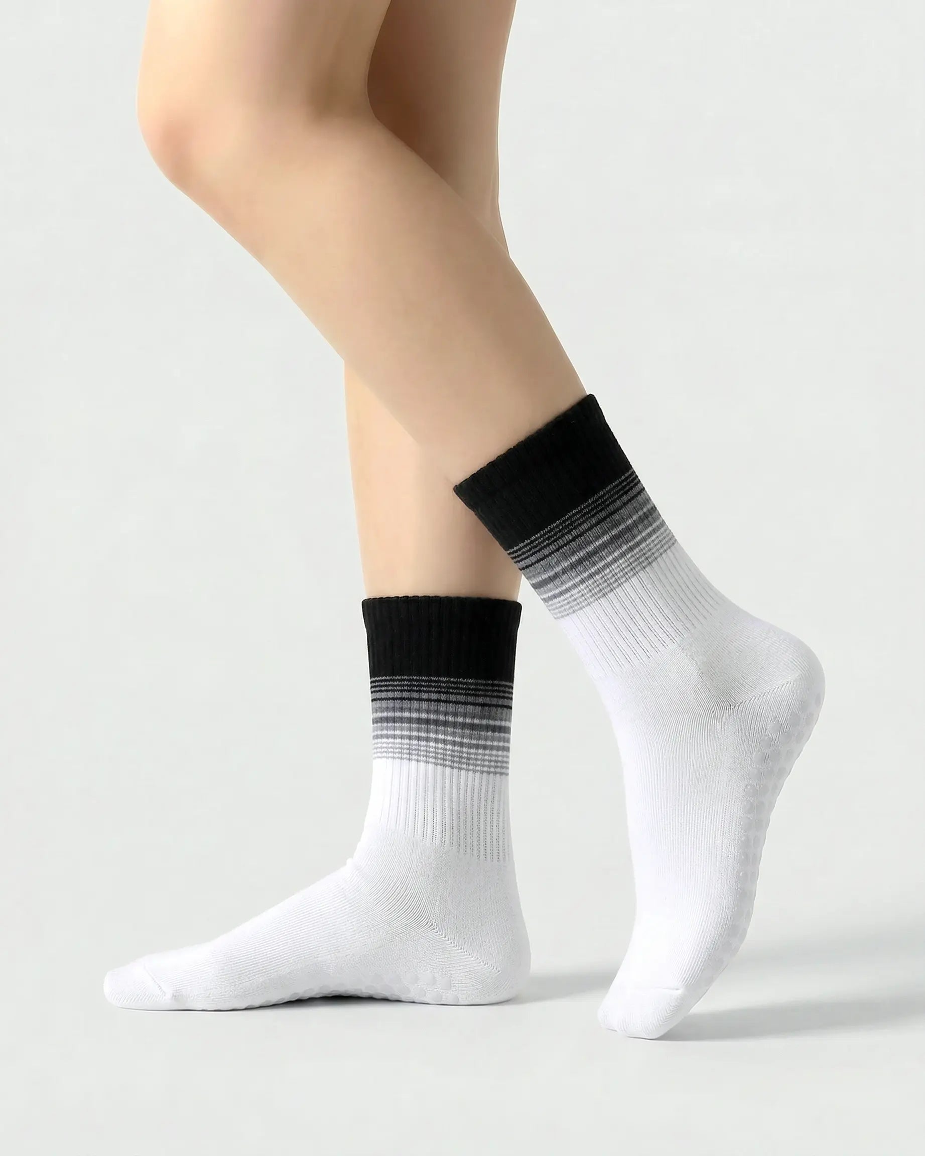 black-white | 01 | Crew grip socks main image showing black and white gradient stripes, ribbed knit texture, and clean studio presentation