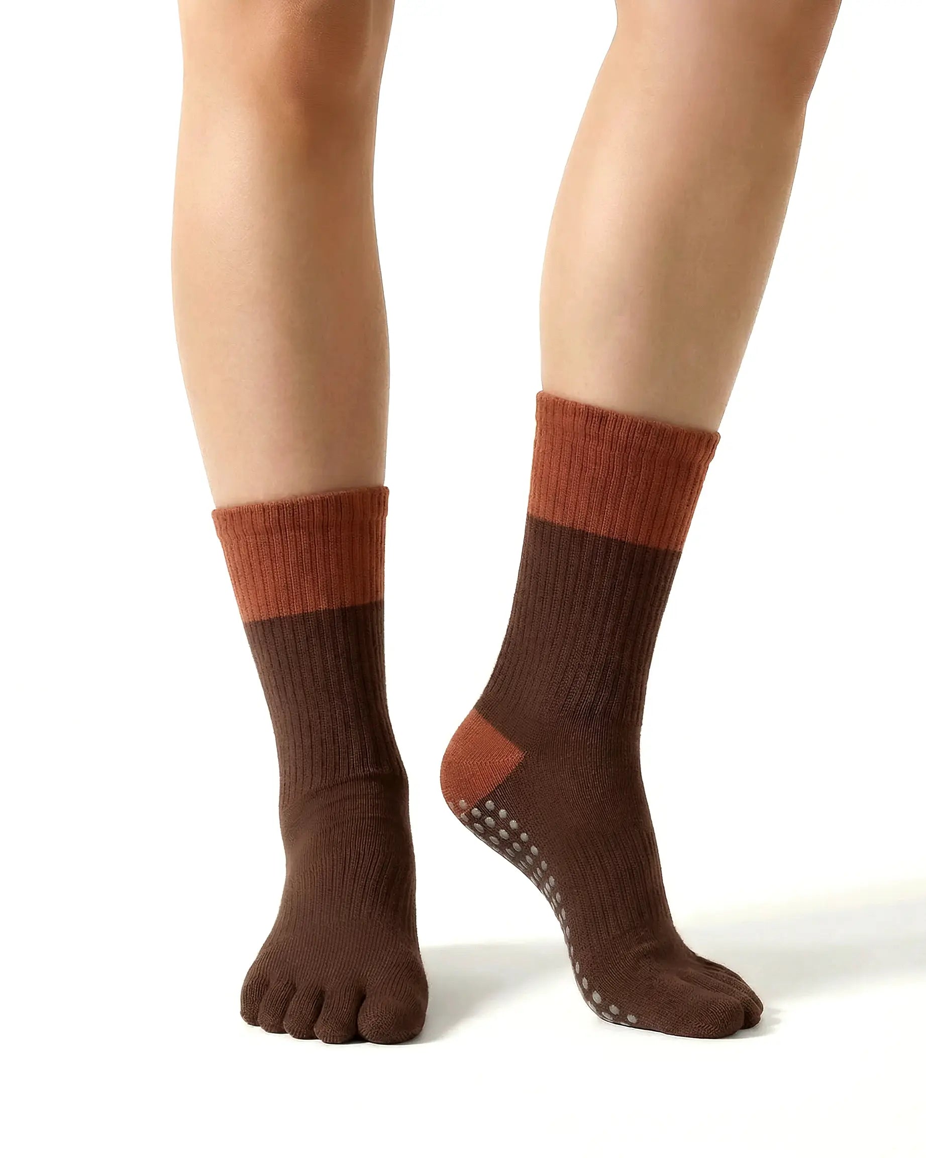 brown | 04 | Brown color block five-toe grip socks front standing view showing five-toe silhouette, contrast toe and heel panels, and studio-ready grip styling