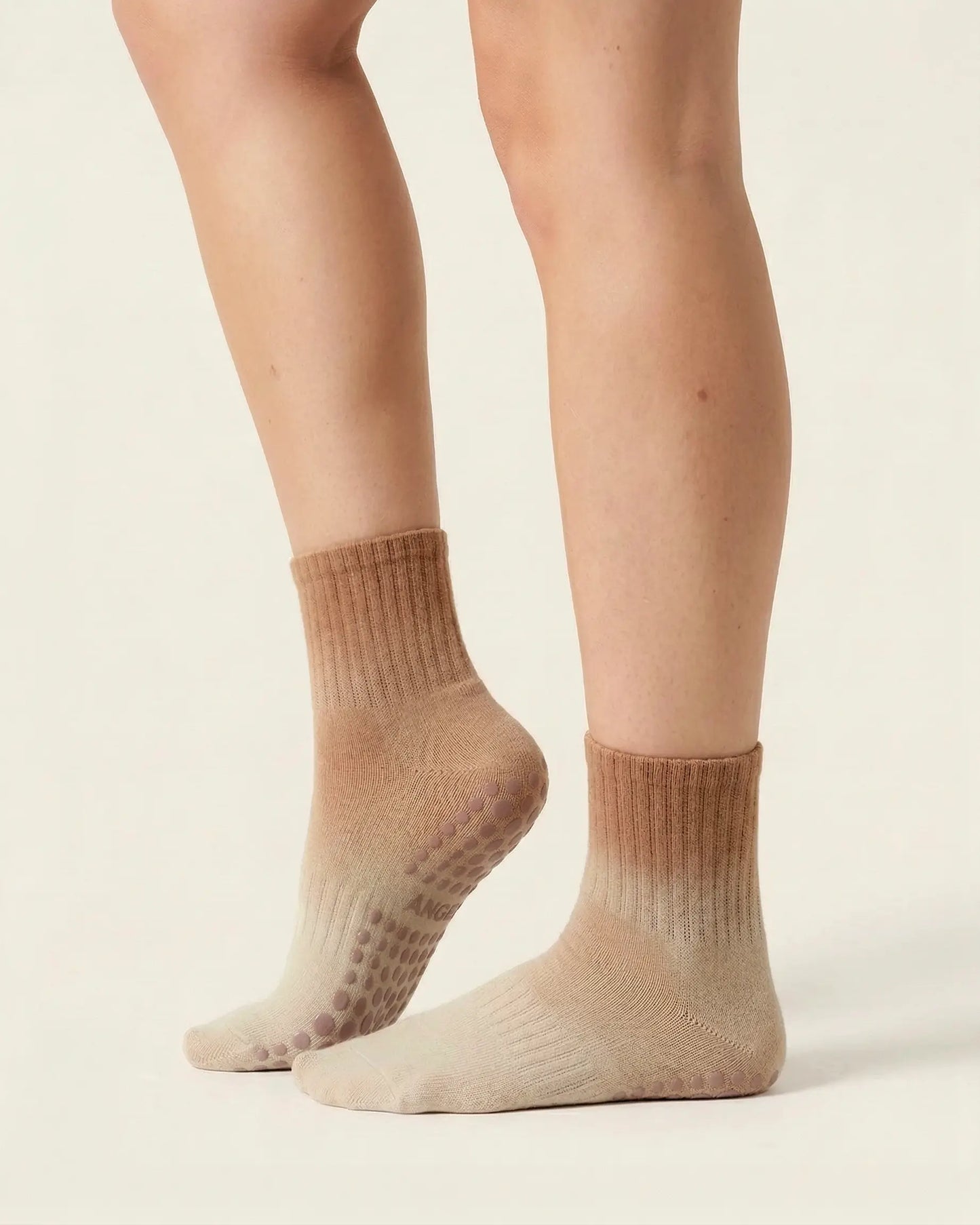 camel | 03 | Camel gradient mid-crew grip socks front standing view showing soft ombré color shift, clean mid-crew silhouette, and studio everyday styling
