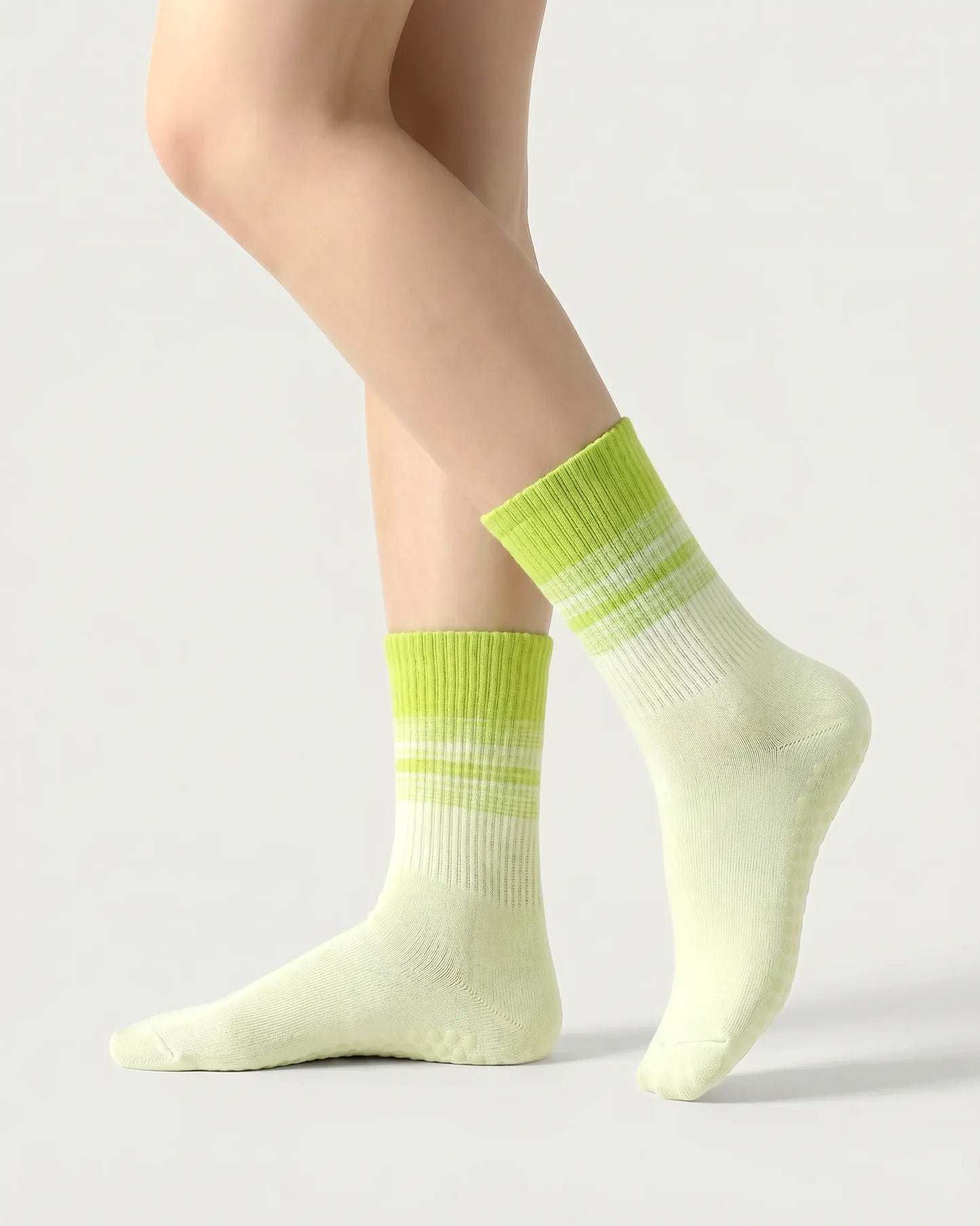 green | 01 | Crew grip socks main image showing green gradient stripes, ribbed knit texture, and clean studio presentation