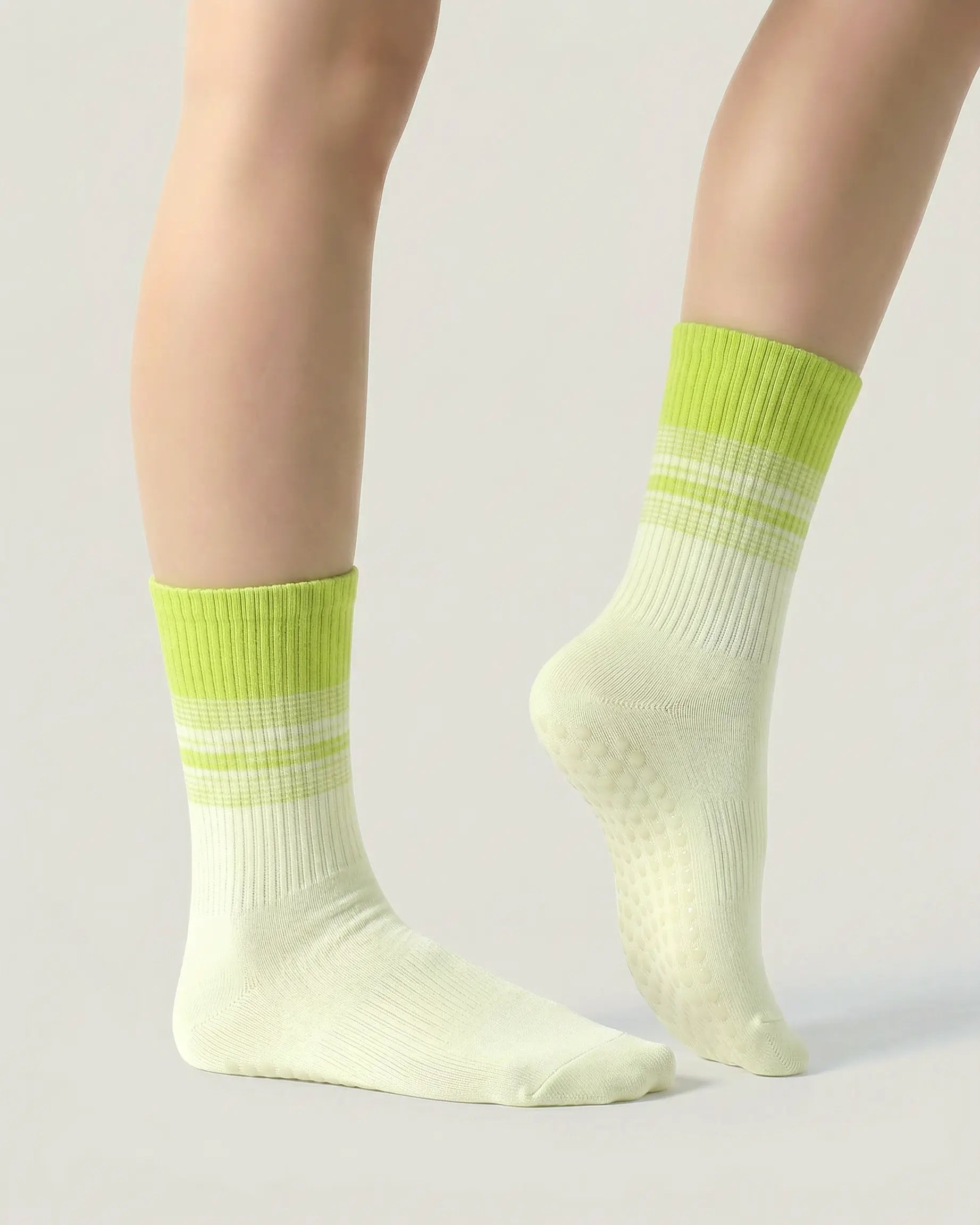green | 03 | Crew grip socks side standing view showing green contrast stripes, cream base, and refined studio silhouette