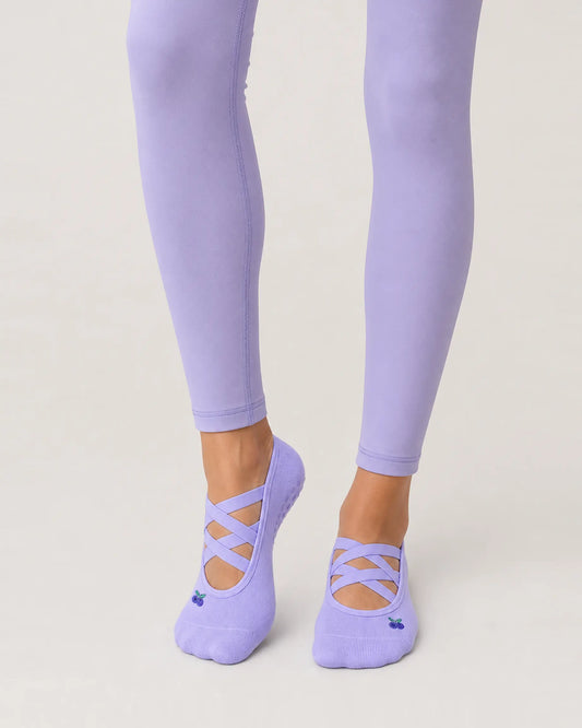 lavender | 01 | Lavender Color-Pop Low-Cut Grip Socks front angled standing view showing the open-instep crisscross straps, low-cut fit, and mini embroidery detail