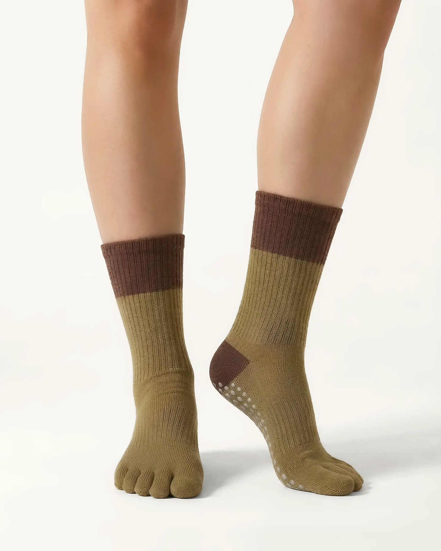 olive-green | 04 | Olive green color block five-toe grip socks front standing view showing five-toe silhouette, contrast toe and heel panels, and studio-ready grip styling