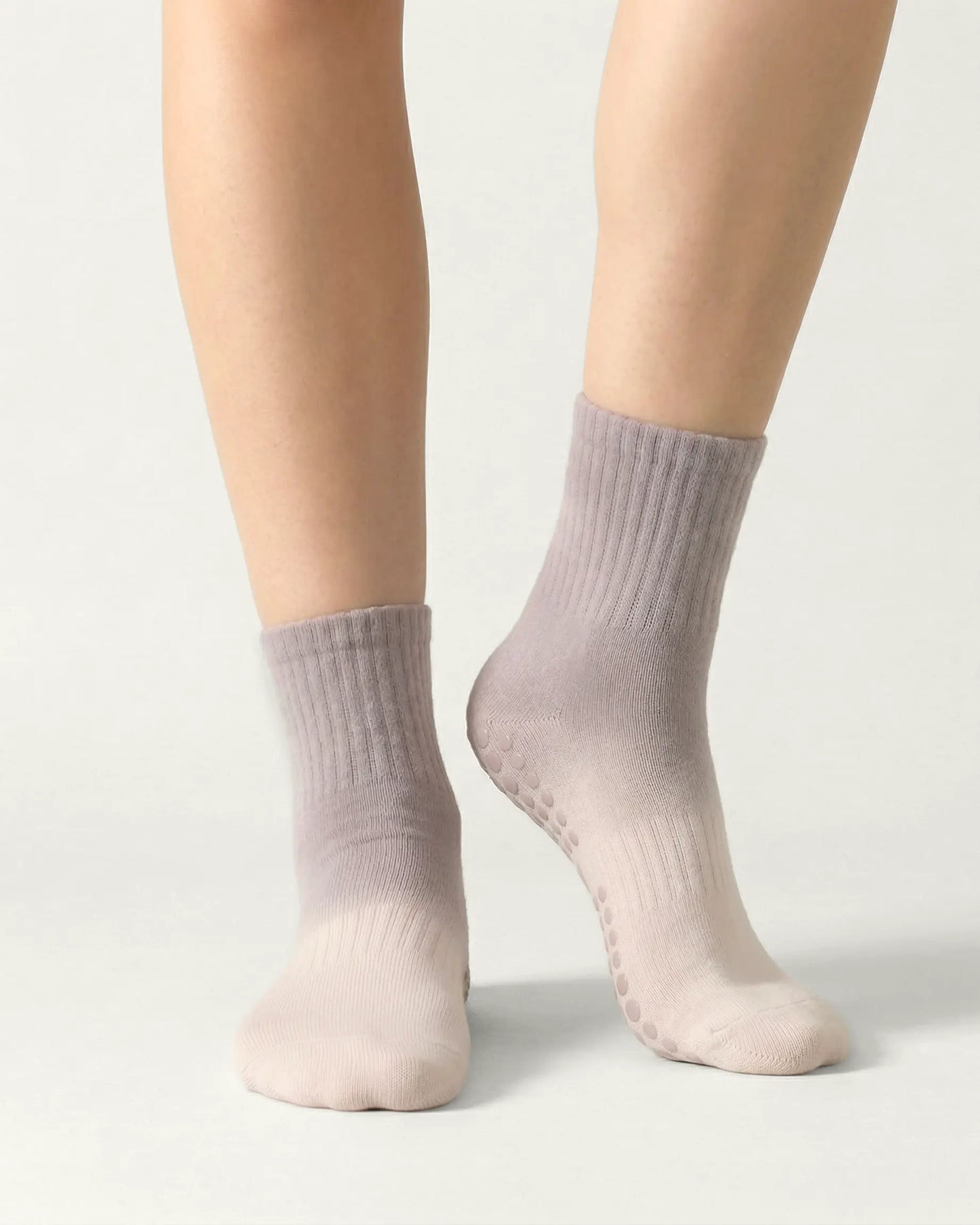 pink-grey | 04 | Pink grey gradient mid-crew grip socks front standing view highlighting fine knit look, subtle gradient tone, and non-slip sole construction