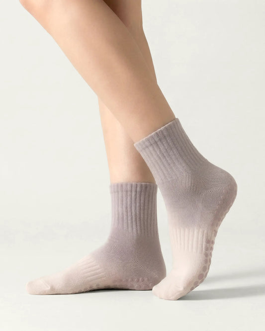 pink-grey | 01 | Pink grey gradient mid-crew grip socks side standing view showing soft knit texture, gradient ombré transition, and sole grip detail