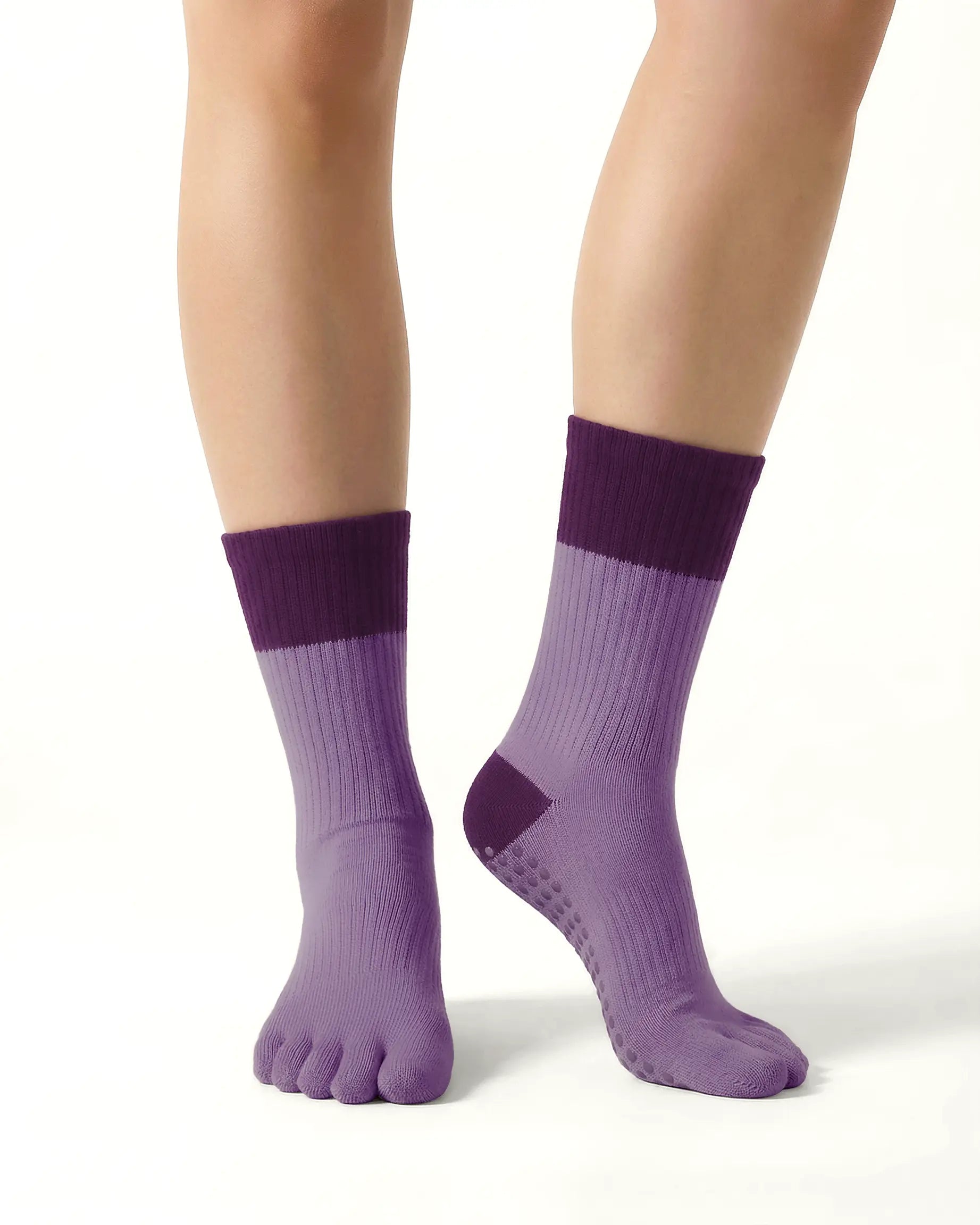 purple | 04 | Purple color block five-toe grip socks front standing view showing five-toe silhouette, contrast toe and heel panels, and studio-ready grip styling