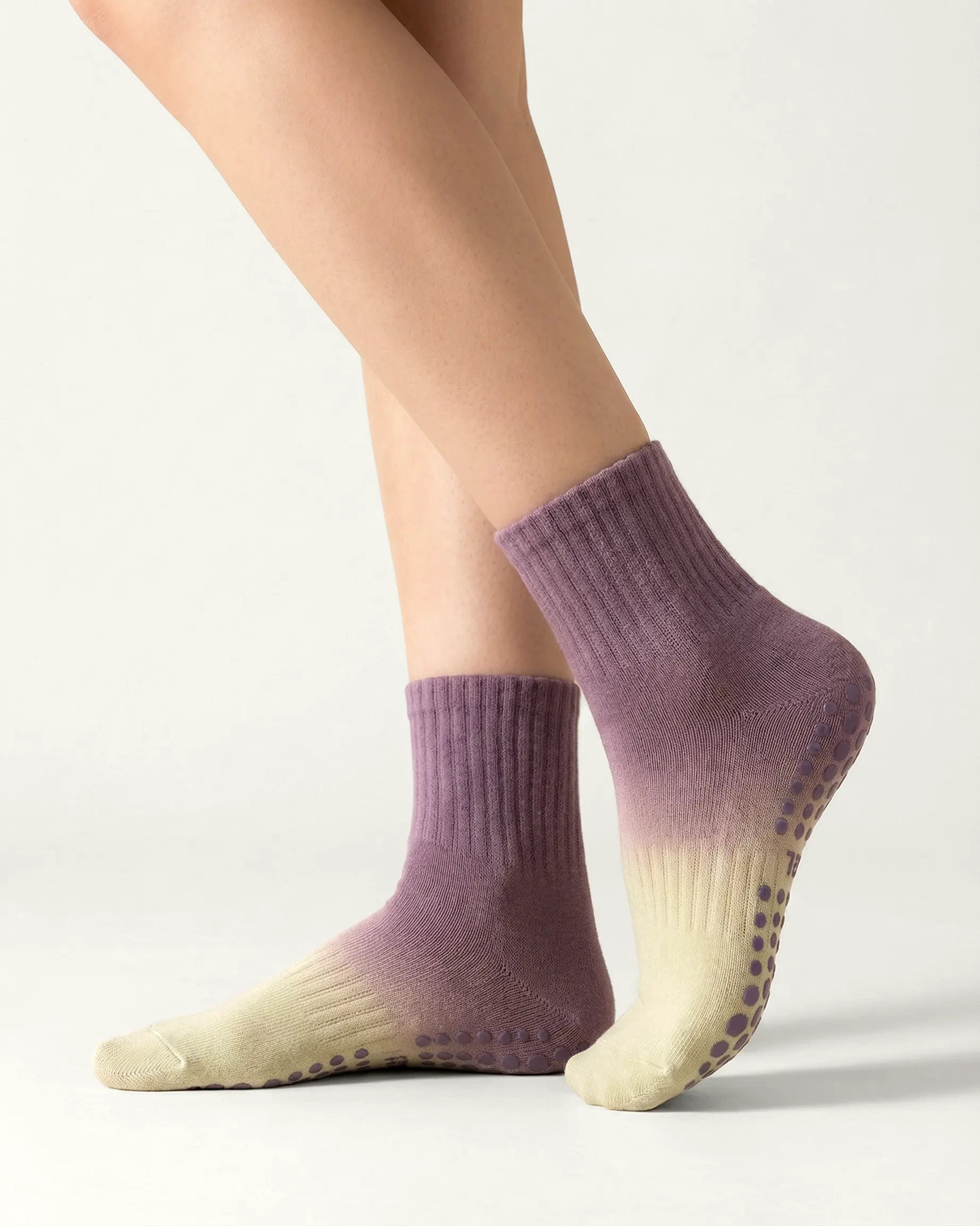 purple-green | 01 | Purple green gradient mid-crew grip socks side standing view showing soft knit texture, gradient ombré transition, and sole grip detail