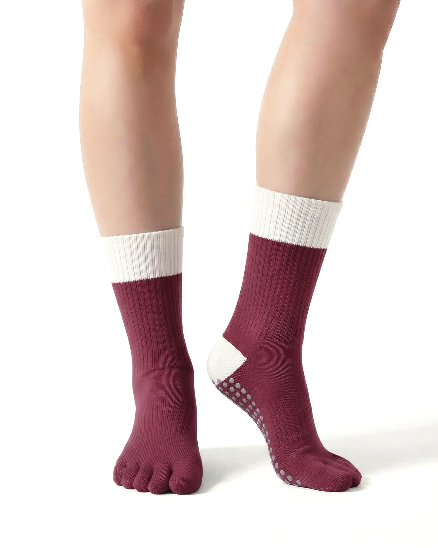 red | 04 | Red color block five-toe grip socks front standing view showing five-toe silhouette, contrast toe and heel panels, and studio-ready grip styling