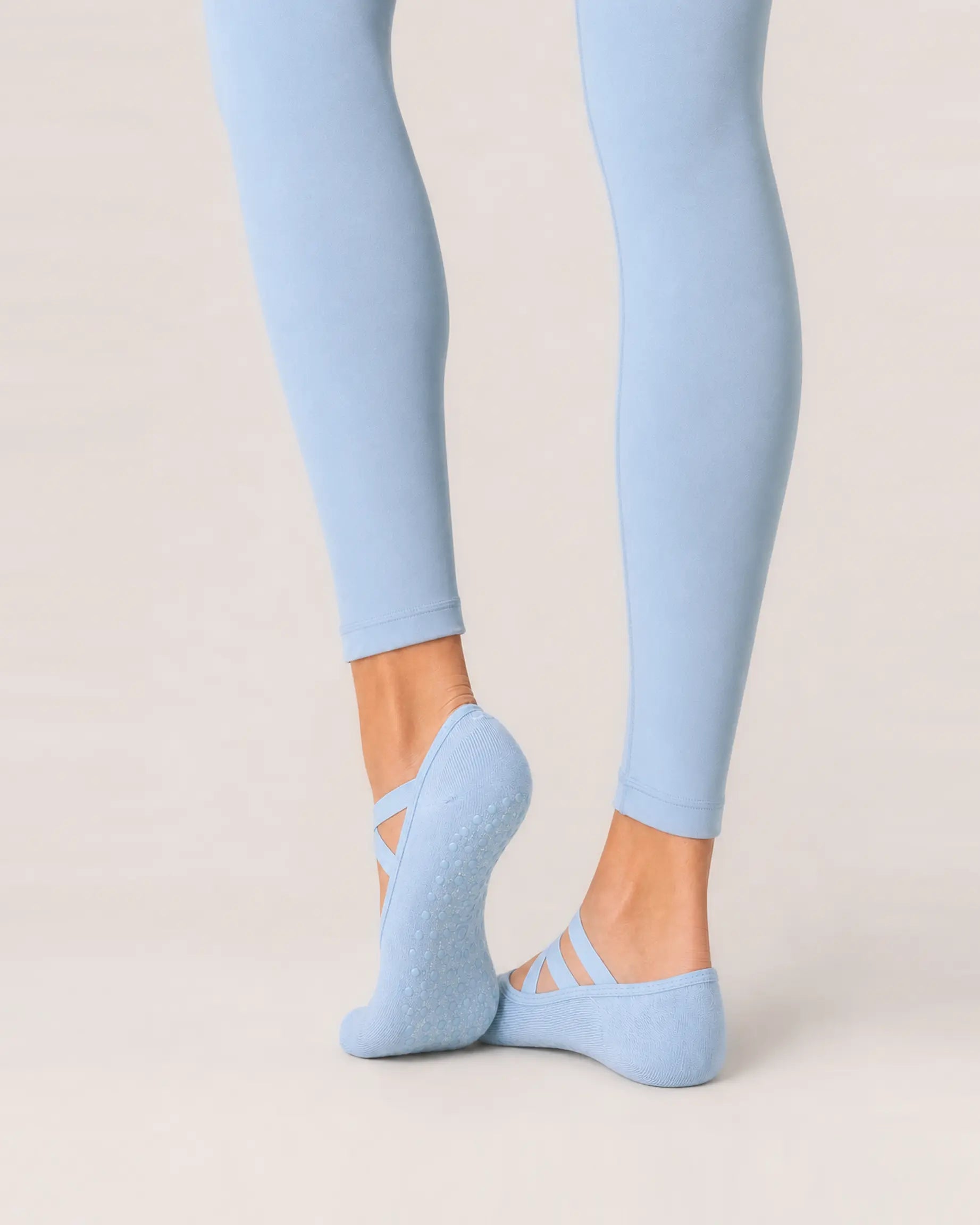 sky-blue | 04 | Sky blue Color-Pop Low-Cut Grip Socks rear angled sole view showing the full-sole grip pattern, covered heel, and low-cut construction