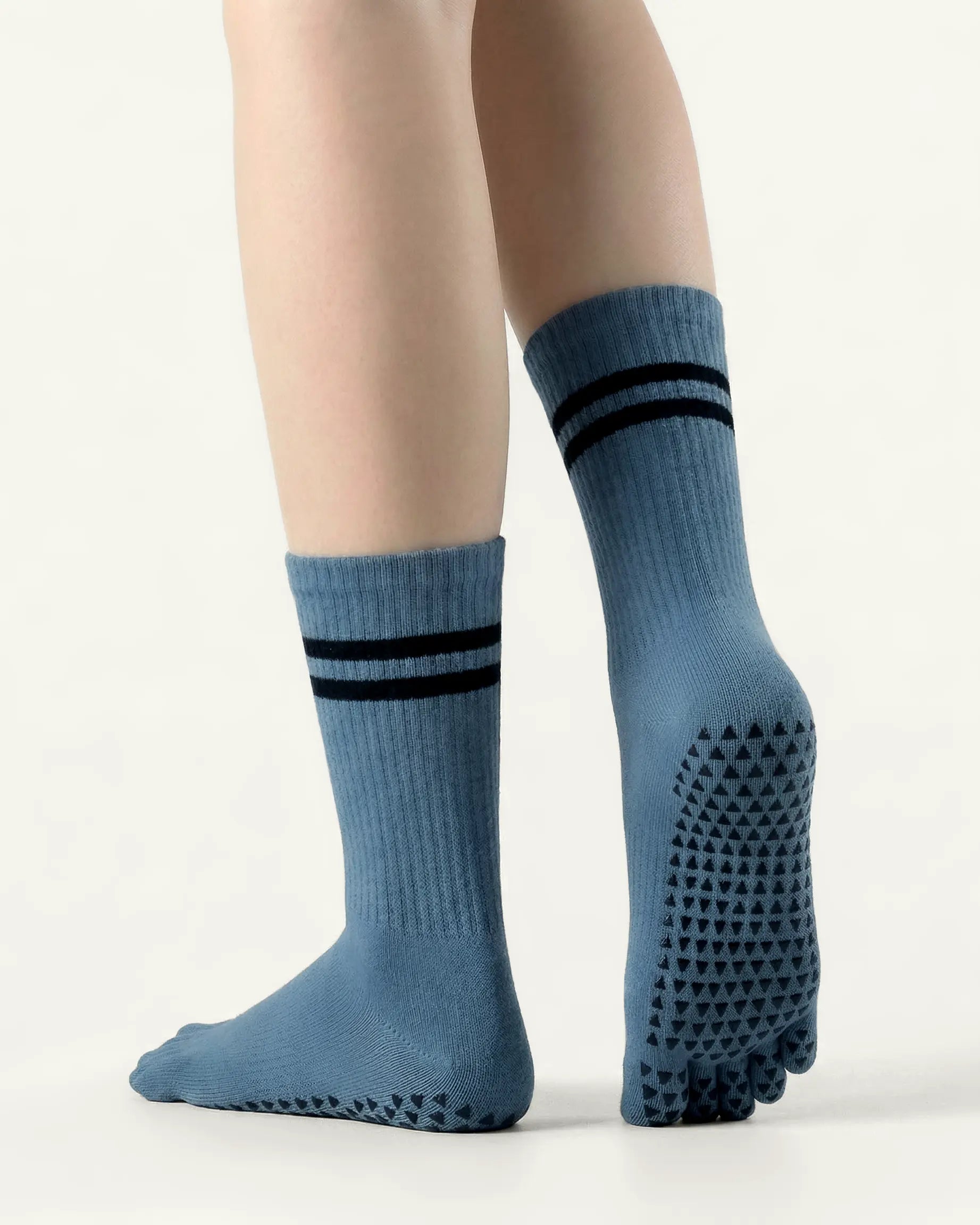 blue-grey | 02 | Blue grey double-stripe five-toe grip socks back view showing sole grip pattern, stripe detail, and ribbed knit texture