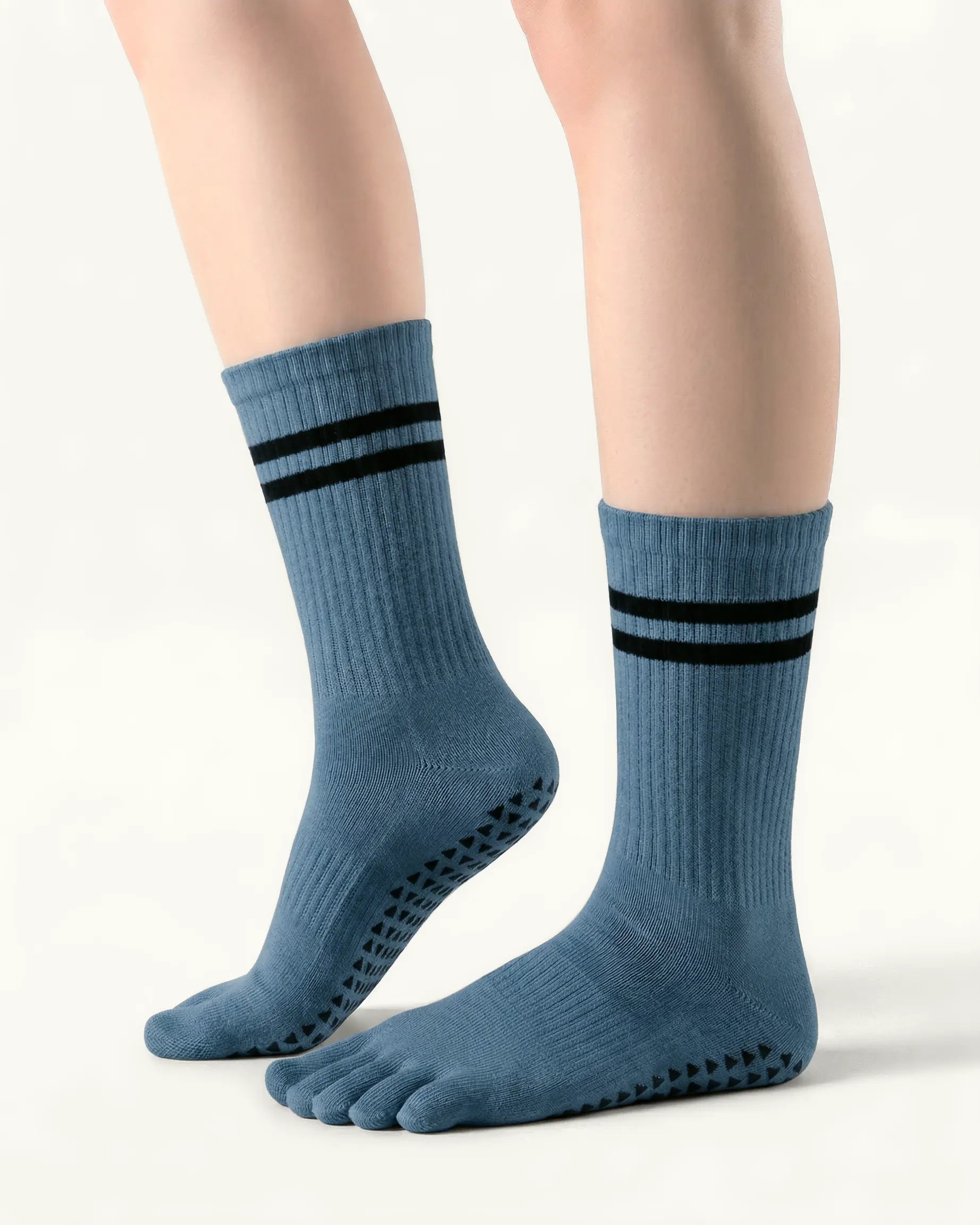 blue-grey | 01 | Blue grey double-stripe five-toe grip socks side lift view showing ribbed texture, stripe detail, and toe separation