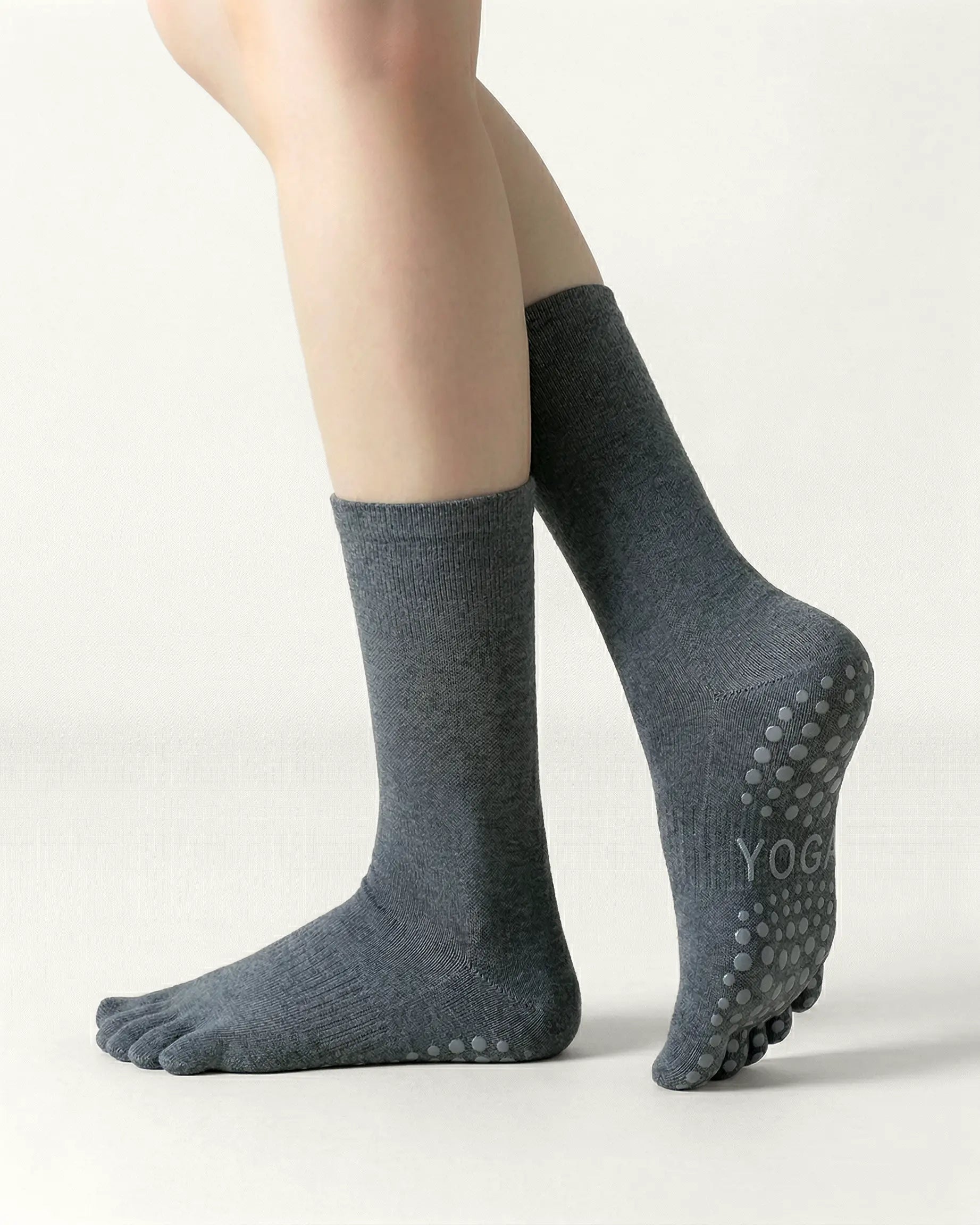 dark-grey | 03 | Dark-grey minimal five-toe grip socks side standing view showing clean texture, toe separation, and overall fit