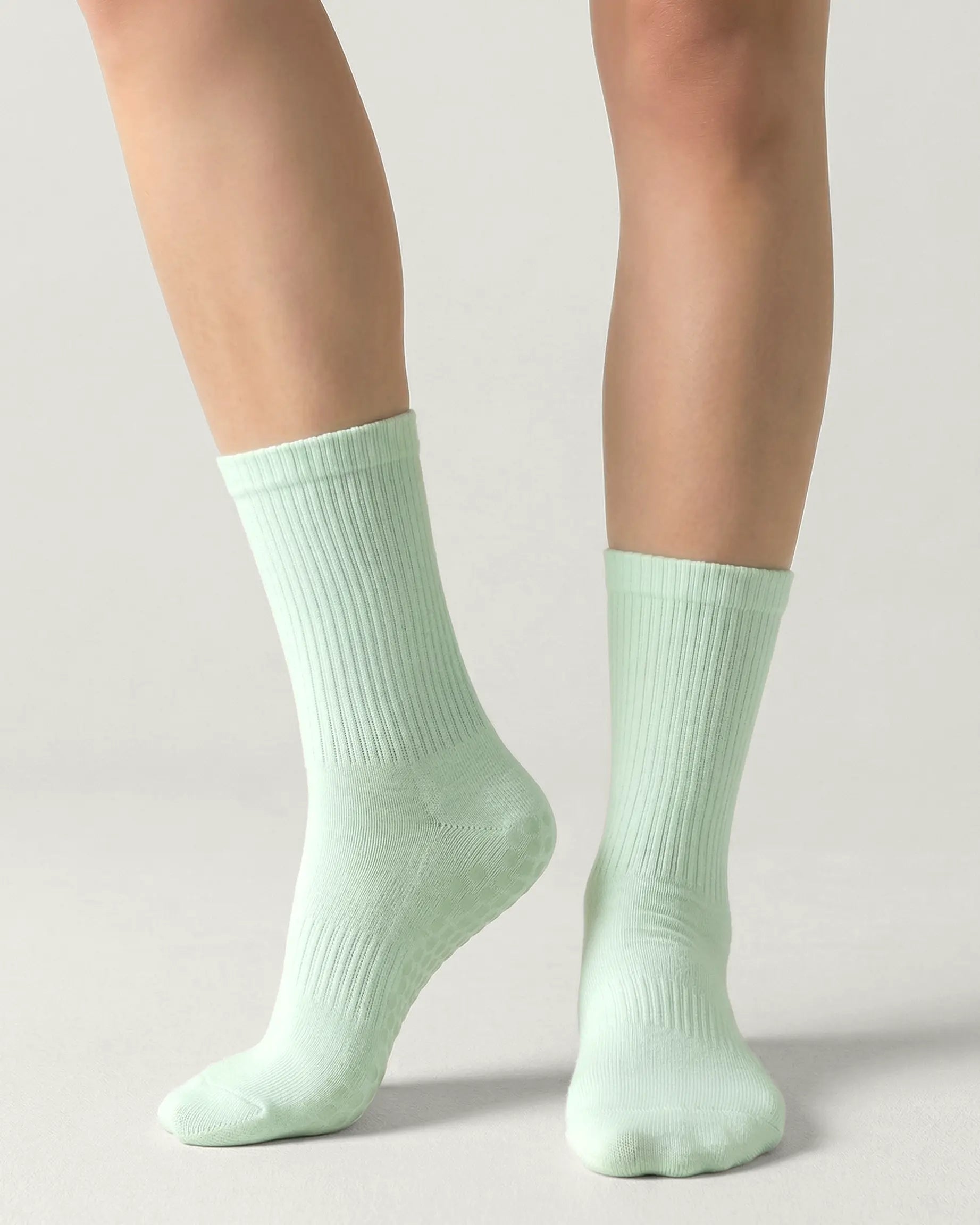green | 04 | Green crew grip socks front angled view showing ribbed texture and crew height
