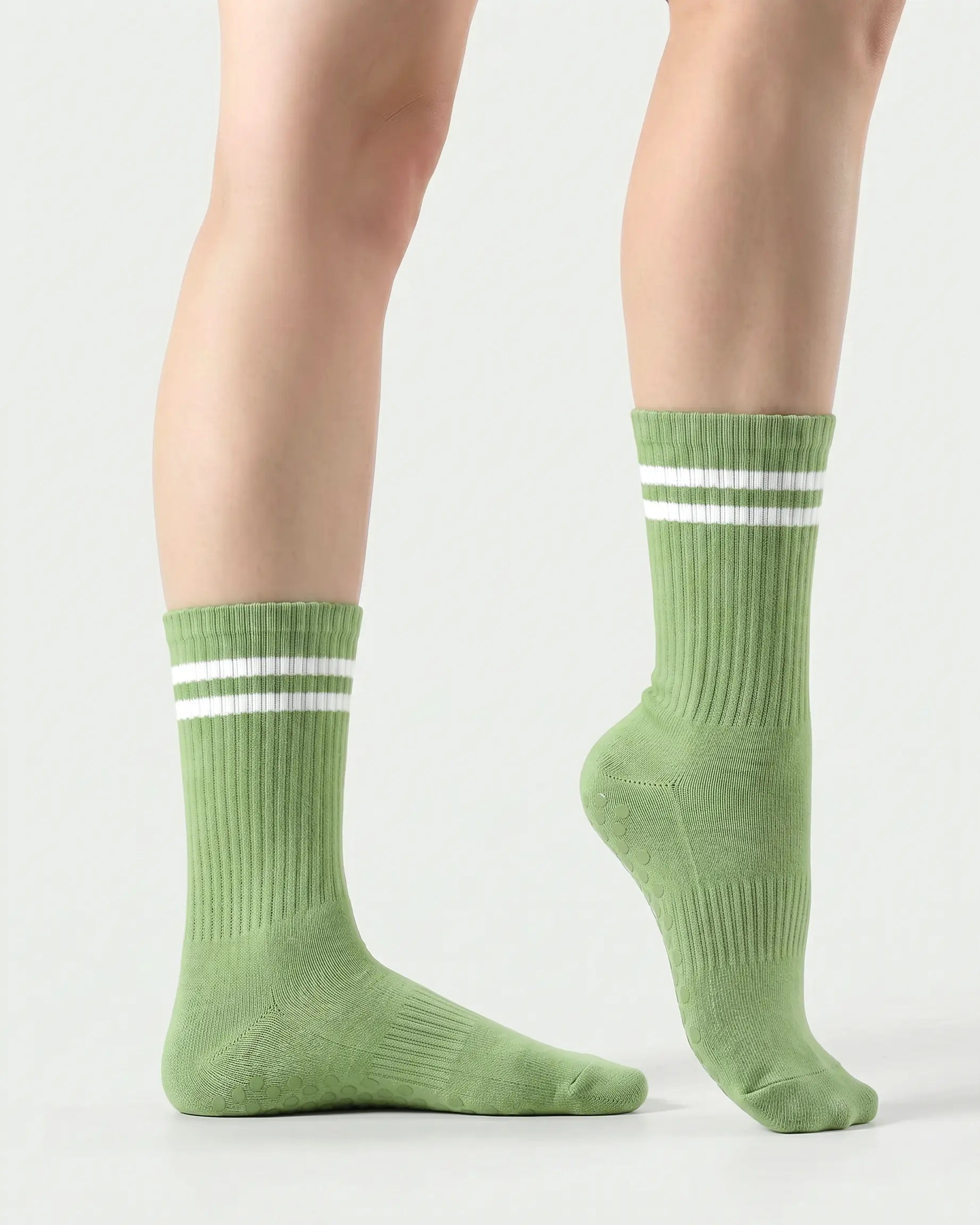 green | 03 | Green double-stripe crew grip socks side standing view showing clean silhouette, contrast stripe detail, and crew fit