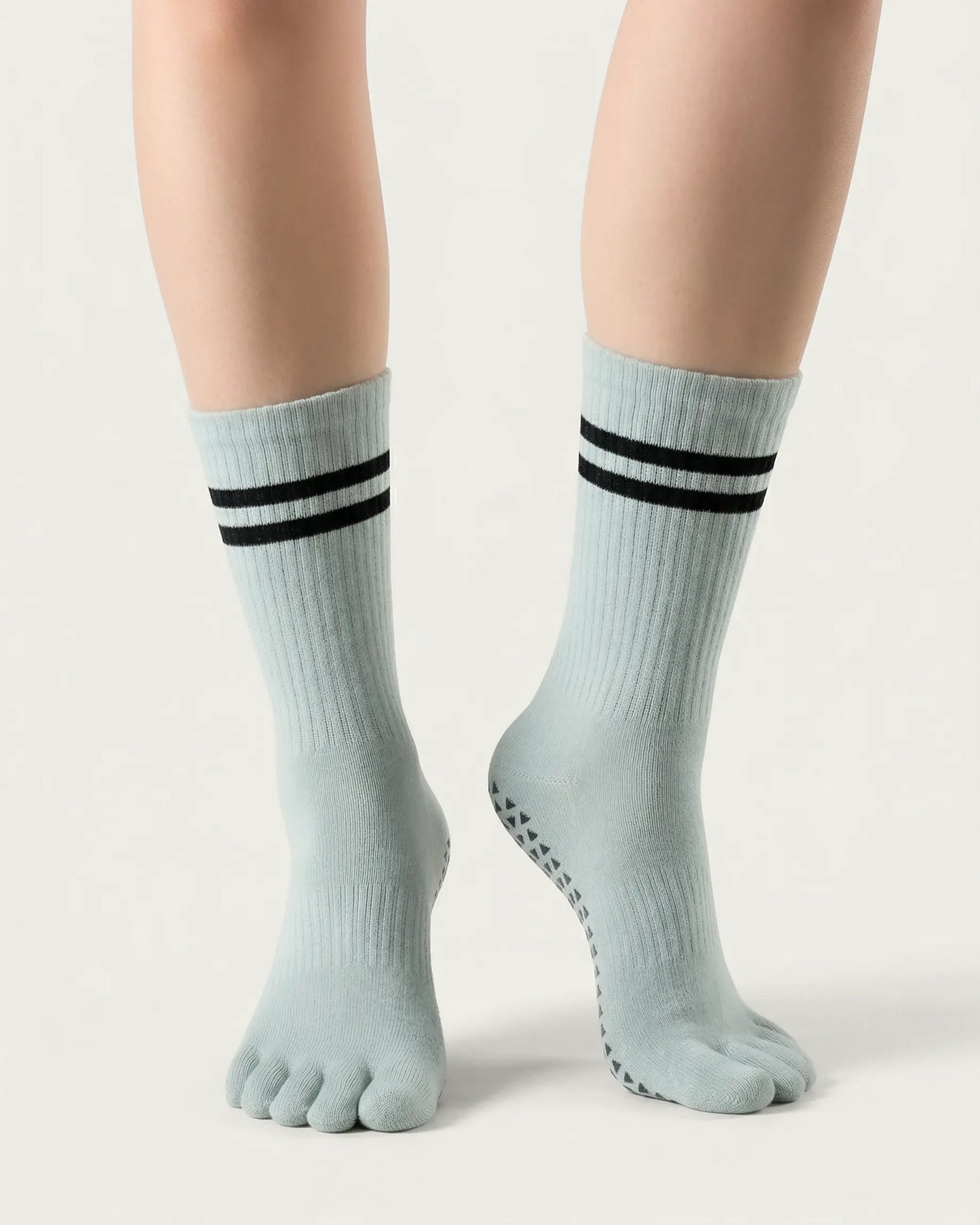 grey-green | 04 | Grey green double-stripe five-toe grip socks front standing view showing stripe detail, toe separation, and overall fit