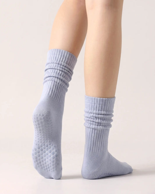 light-blue | 02 | Light blue slouch grip socks back side view showing slouch shape, grip sole detail, and soft ribbed texture