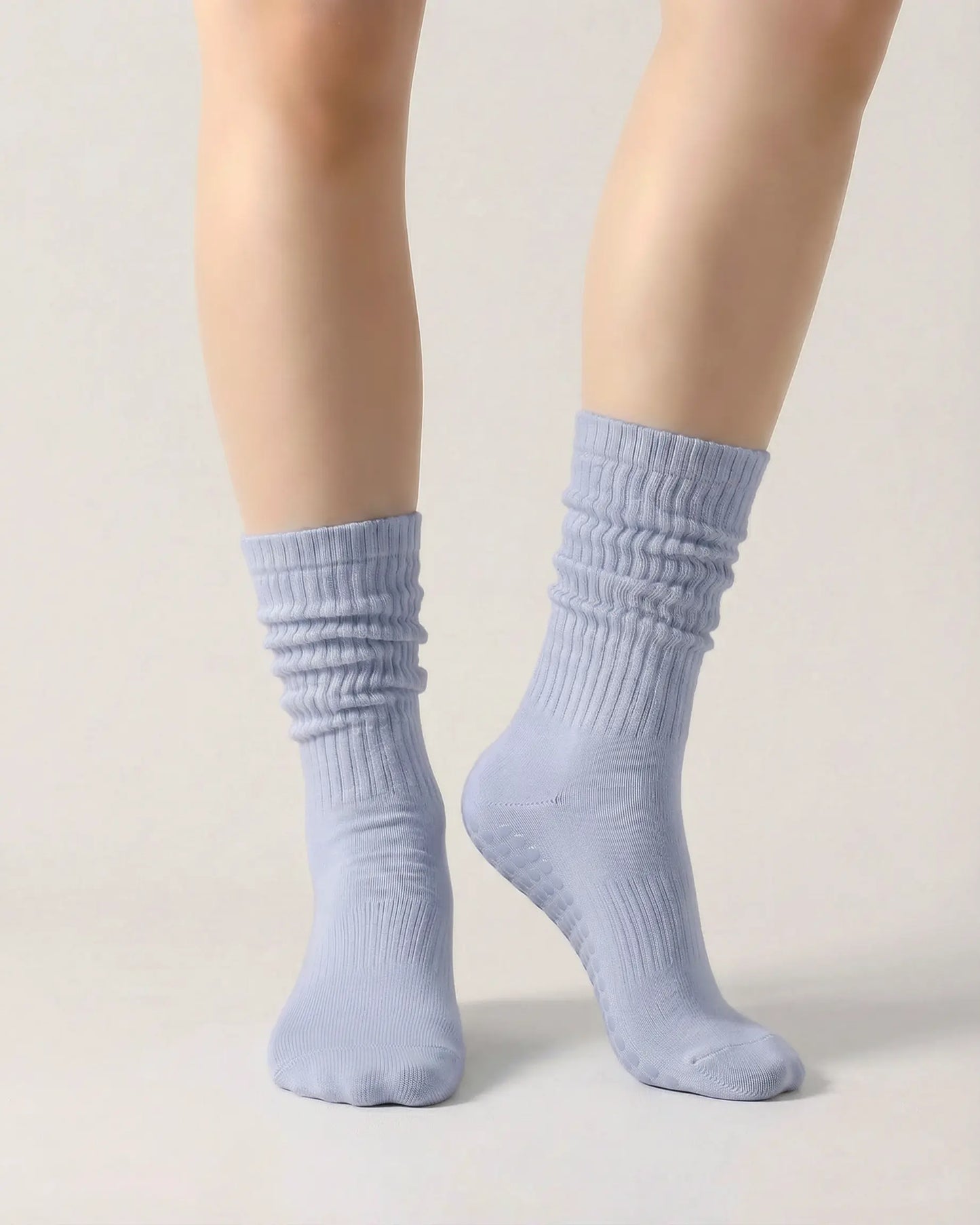 light-blue | 04 | Light blue slouch grip socks front standing view showing crew height, relaxed slouch silhouette, and clean non-slip studio sock styling