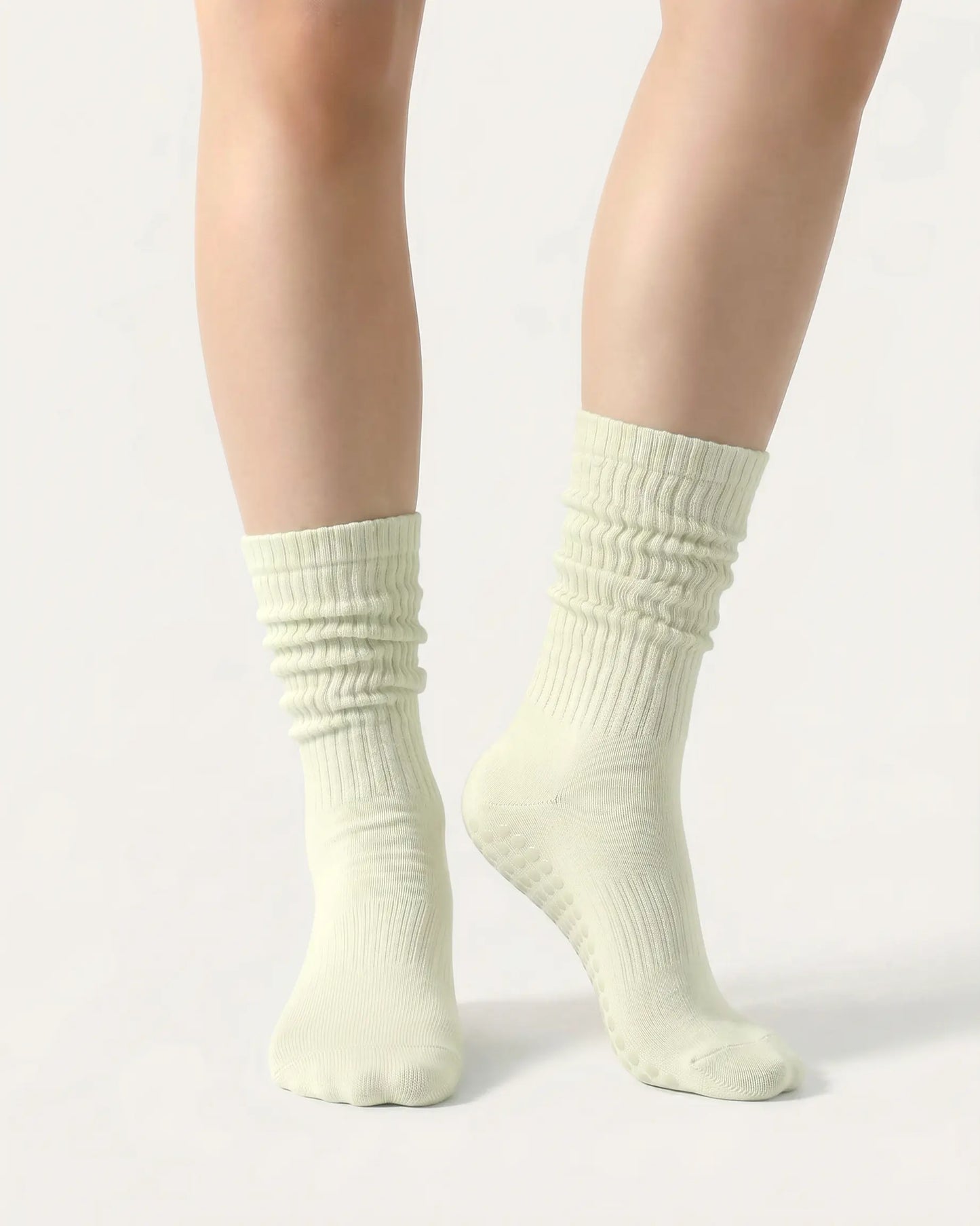light-green | 04 | Light green slouch grip socks front standing view showing crew height, relaxed slouch silhouette, and clean non-slip studio sock styling