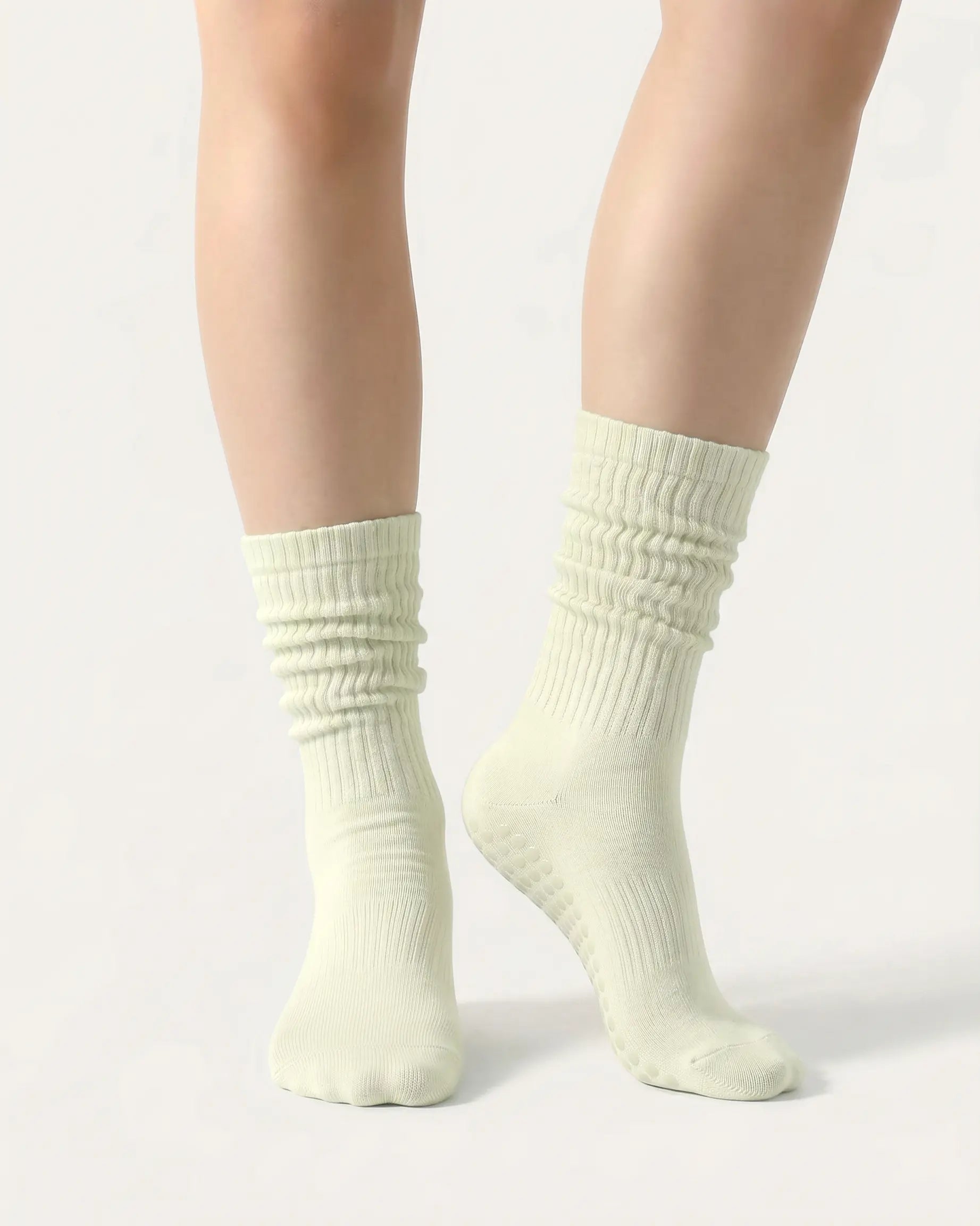 light-green | 04 | Light green slouch grip socks front standing view showing crew height, relaxed slouch silhouette, and clean non-slip studio sock styling