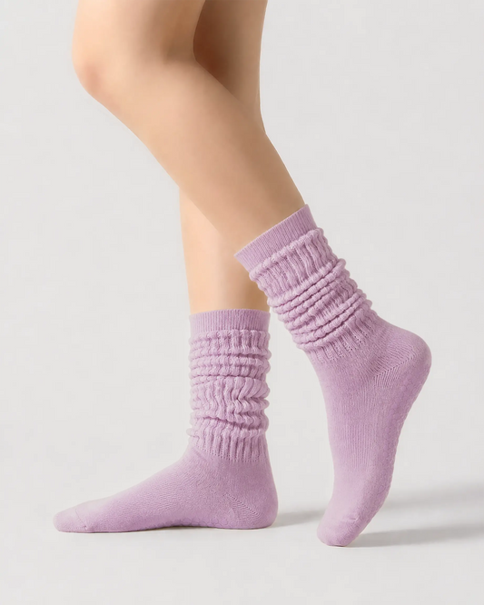 light-purple | 01 | Light purple slouch grip socks side slouch standing view showing relaxed ribbed texture, crew length, and soft studio styling