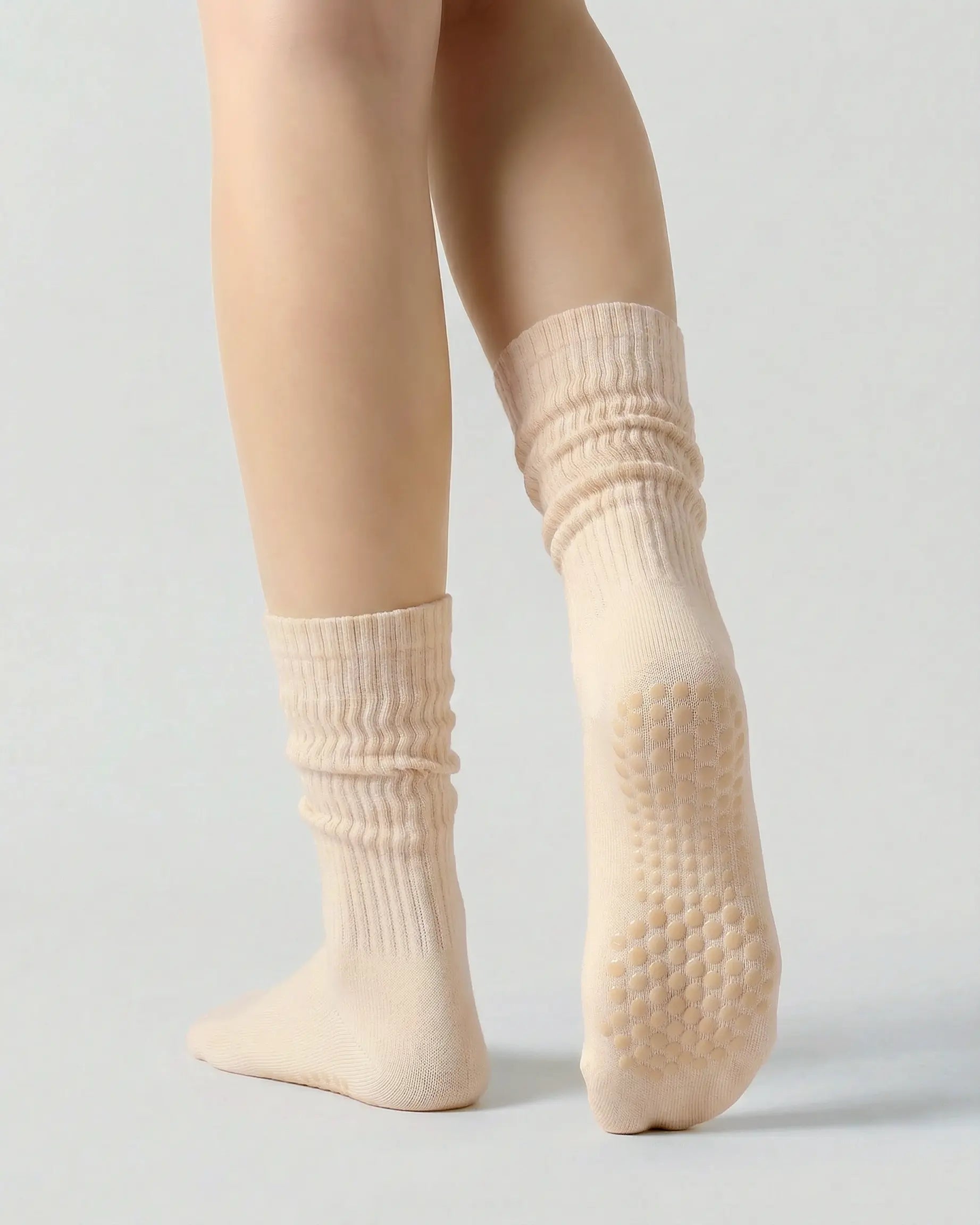 light-yellow | 02 | Light yellow slouch grip socks back side view showing slouch shape, grip sole detail, and soft ribbed texture