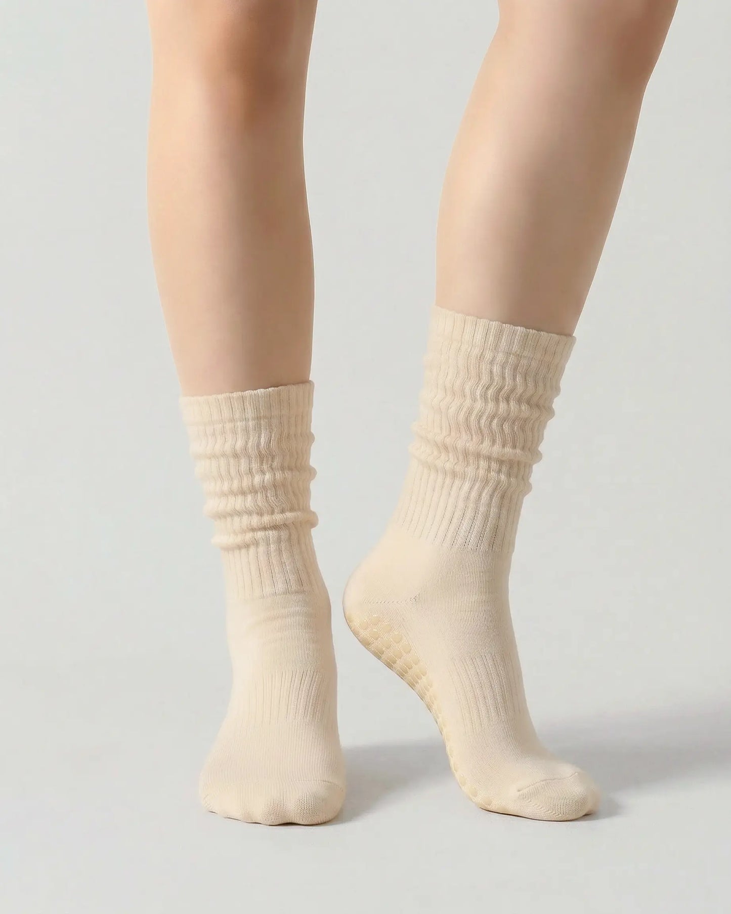 light-yellow | 04 | Light yellow slouch grip socks front standing view showing crew height, relaxed slouch silhouette, and clean non-slip studio sock styling