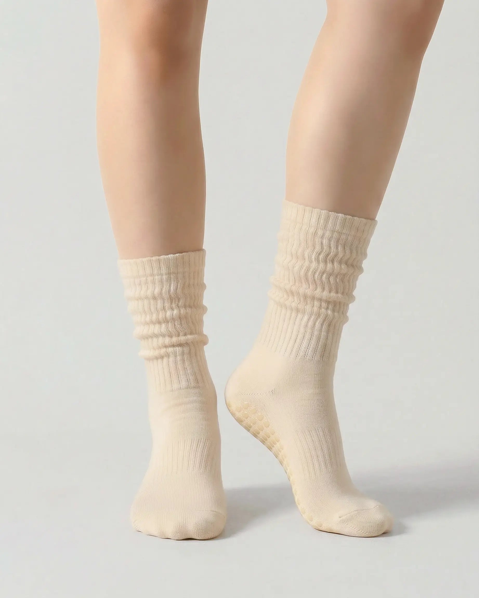 light-yellow | 04 | Light yellow slouch grip socks front standing view showing crew height, relaxed slouch silhouette, and clean non-slip studio sock styling