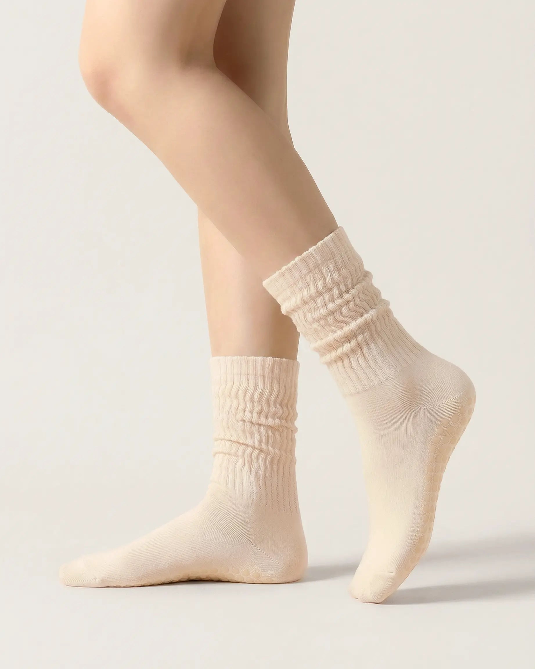 light-yellow | 01 | Light yellow slouch grip socks side slouch standing view showing relaxed ribbed texture, crew length, and soft studio styling