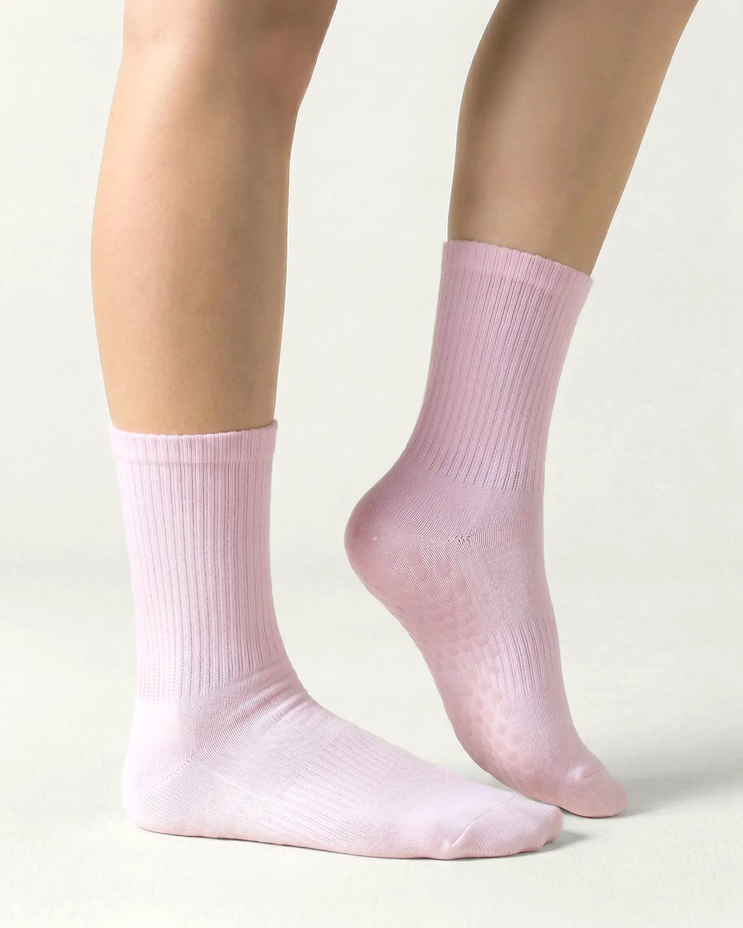 pink | 03 | Pink crew grip socks side standing view showing clean silhouette and crew fit