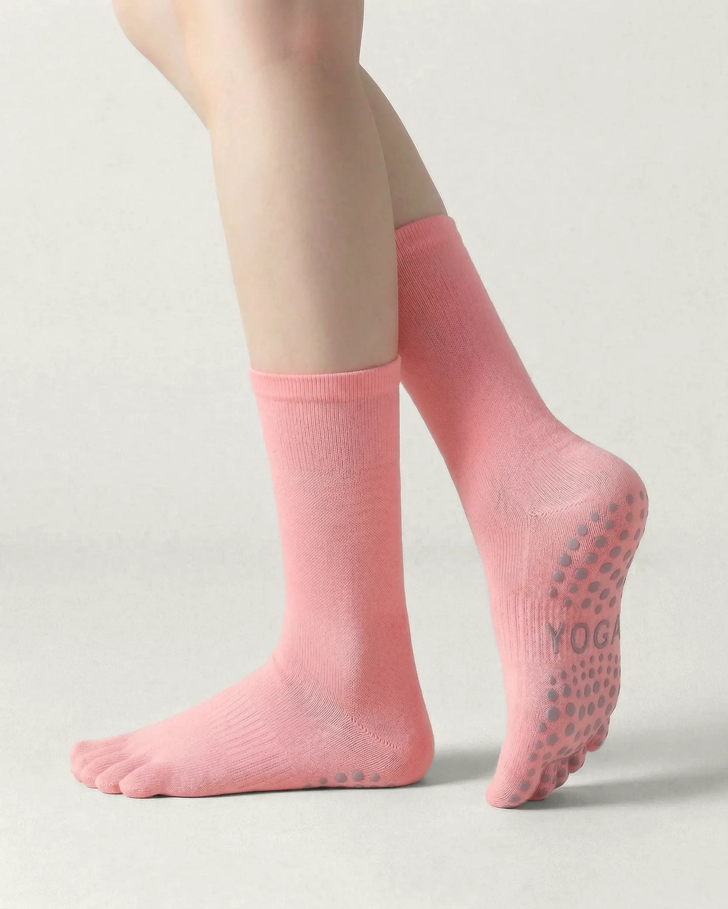 pink | 03 | Pink minimal five-toe grip socks side standing view showing clean texture, toe separation, and overall fit