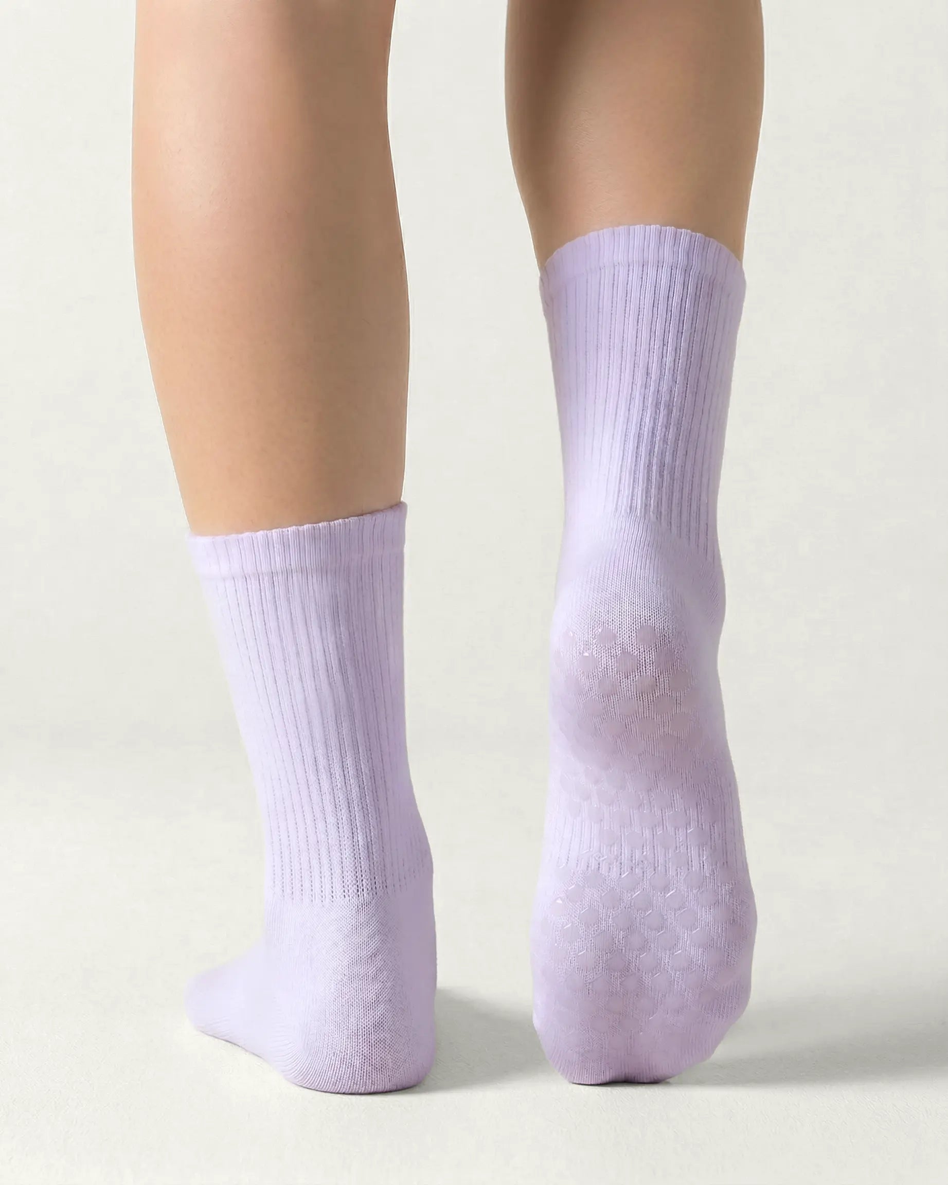 purple | 02 | Purple crew grip socks back view showing sole grip pattern and ribbed knit texture
