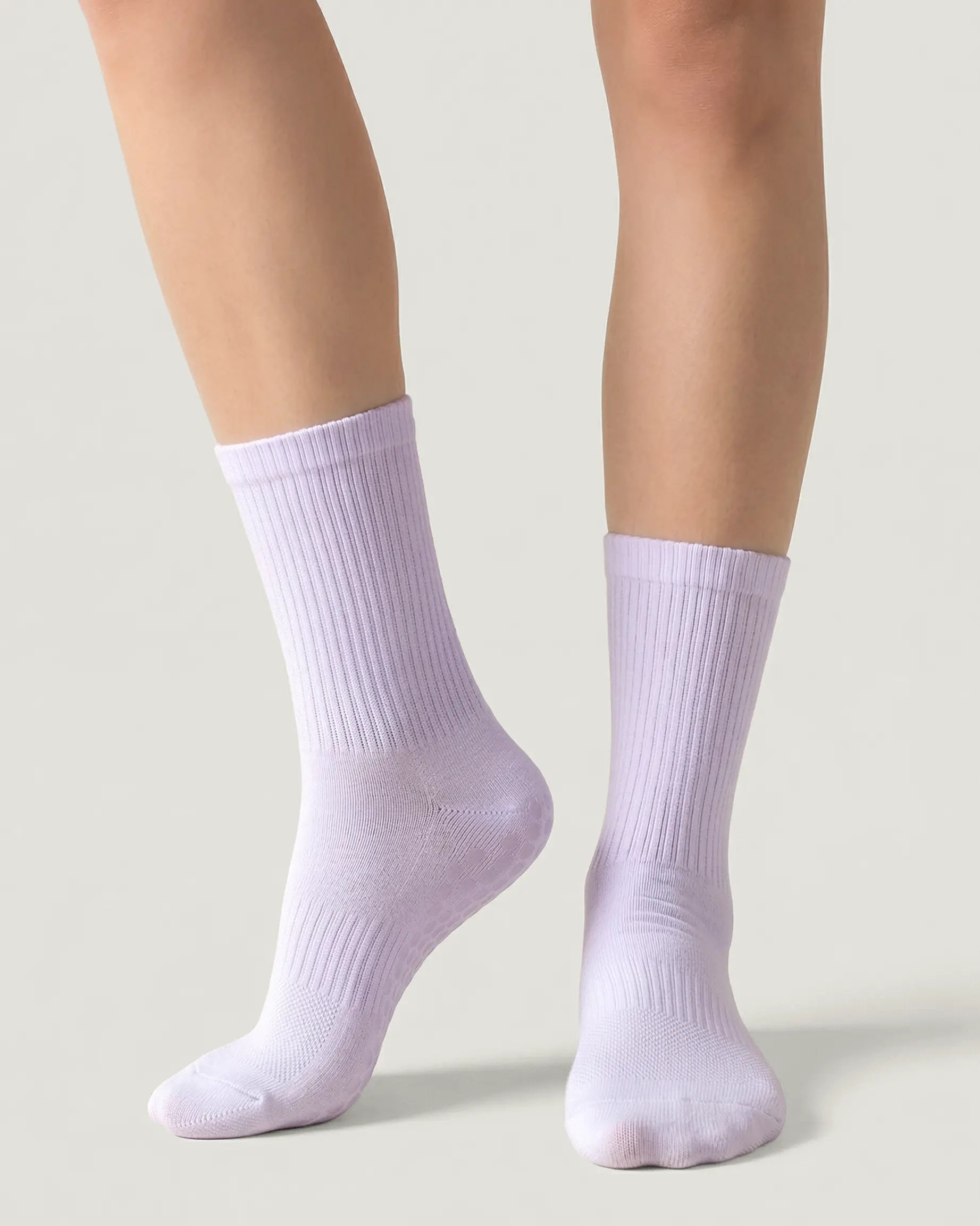 purple | 04 | Purple crew grip socks front angled view showing ribbed texture and crew height