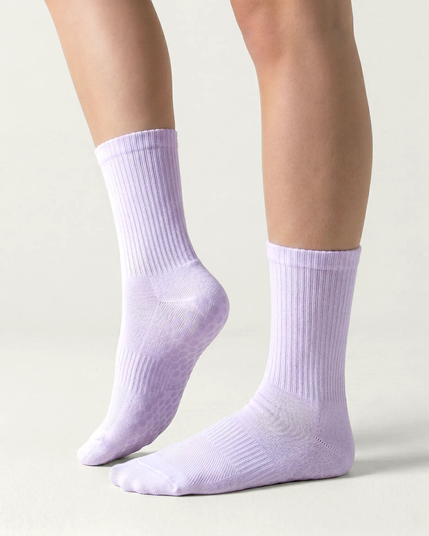 purple | 01 | Purple crew grip socks side lift view showing ribbed texture and crew length