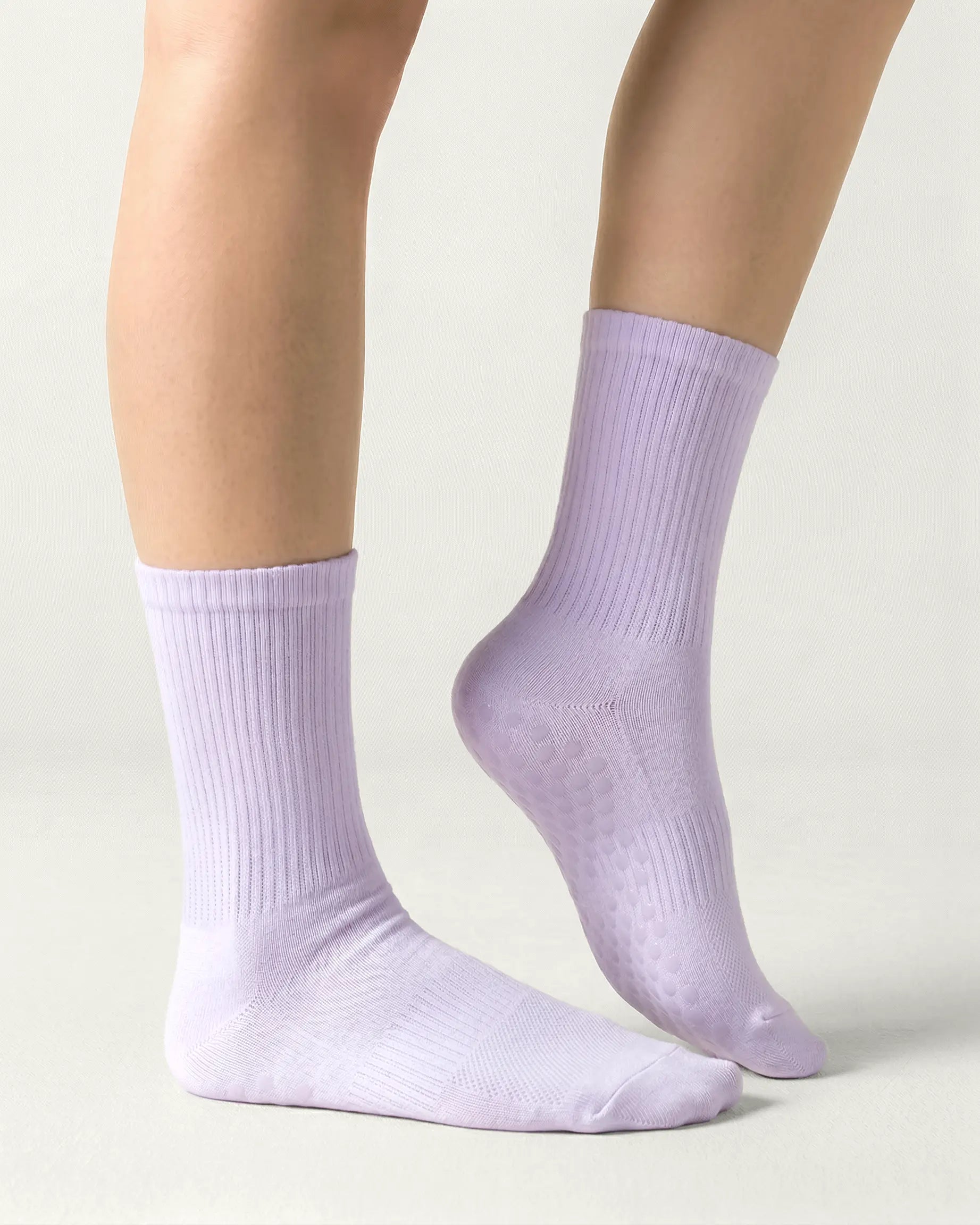 purple | 03 | Purple crew grip socks side standing view showing clean silhouette and crew fit