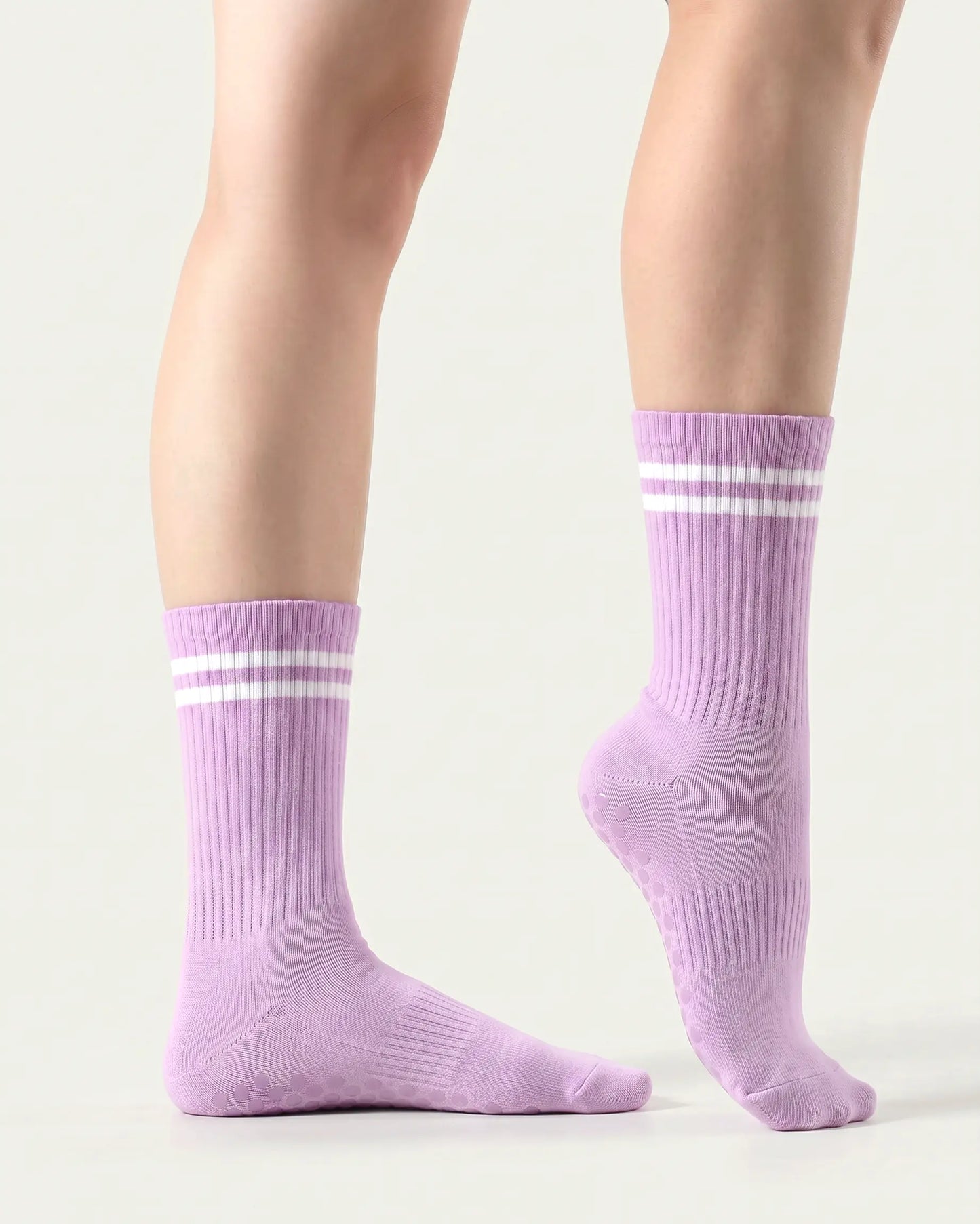 purple | 03 | Purple double-stripe crew grip socks side standing view showing clean silhouette, contrast stripe detail, and crew fit