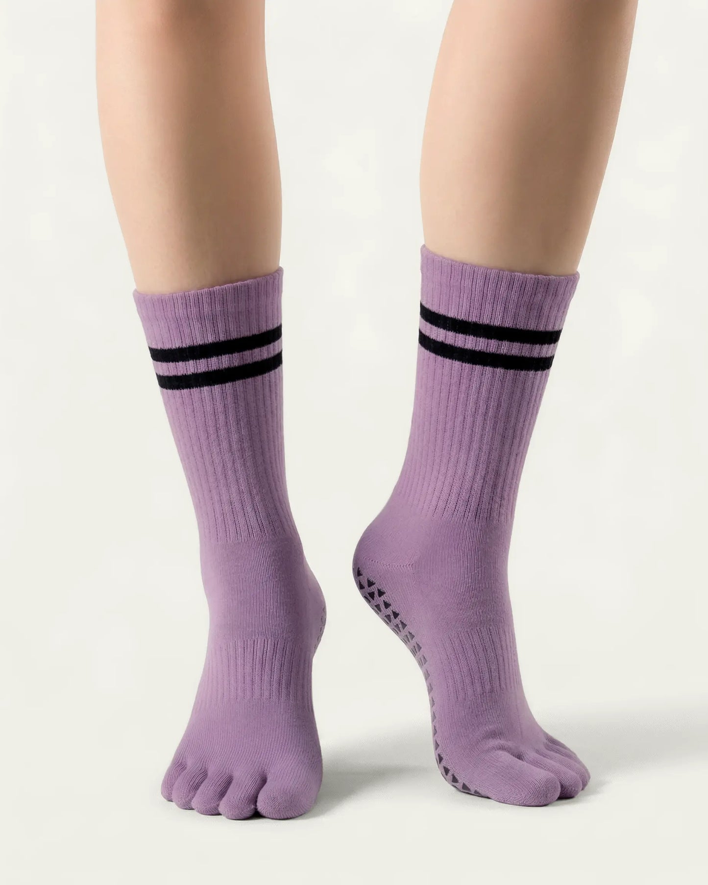 purple | 04 | Purple double-stripe five-toe grip socks front standing view showing stripe detail, toe separation, and overall fit
