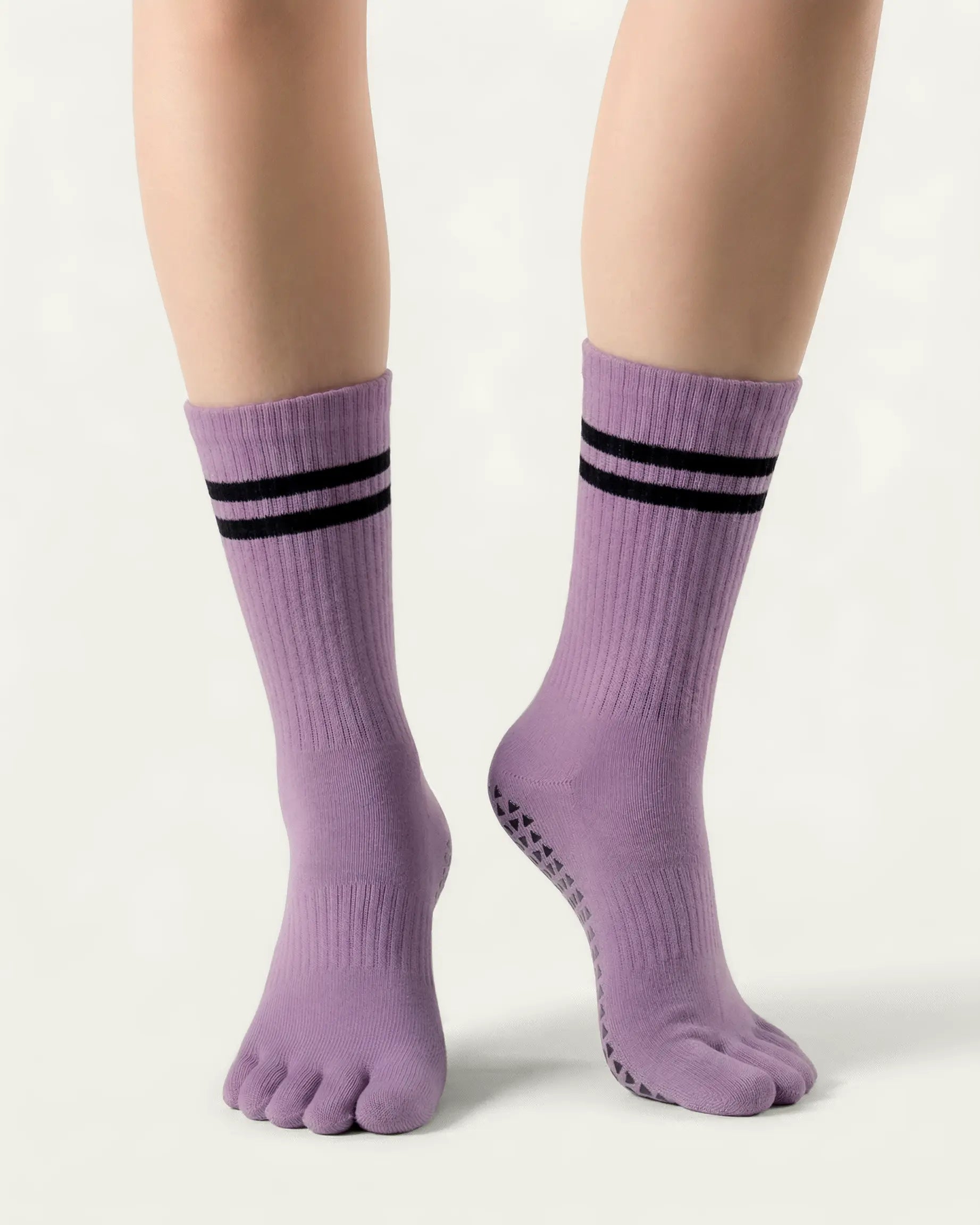 purple | 04 | Purple double-stripe five-toe grip socks front standing view showing stripe detail, toe separation, and overall fit