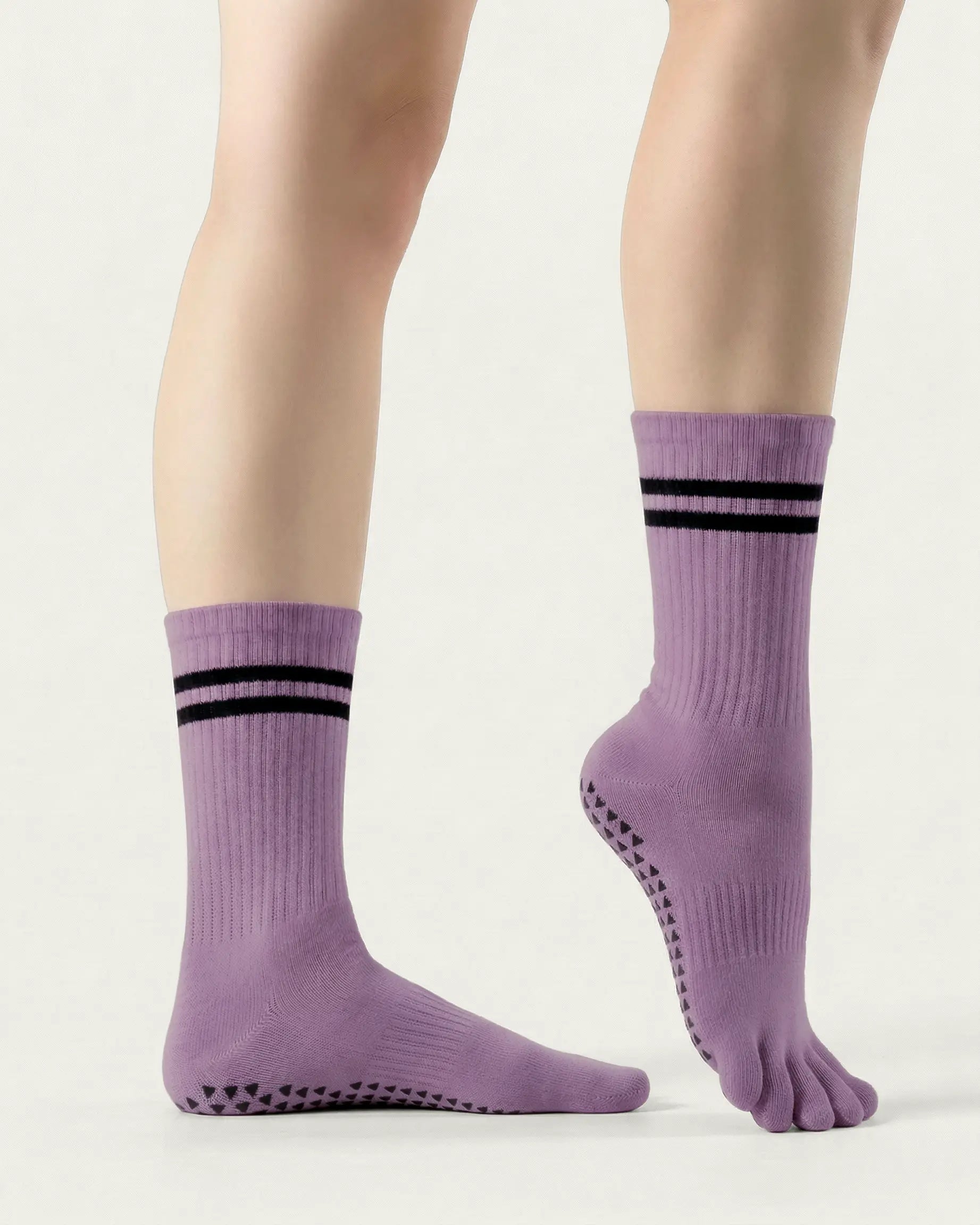 purple | 03 | Purple double-stripe five-toe grip socks side standing view showing ribbed texture, stripe detail, and five-toe silhouette