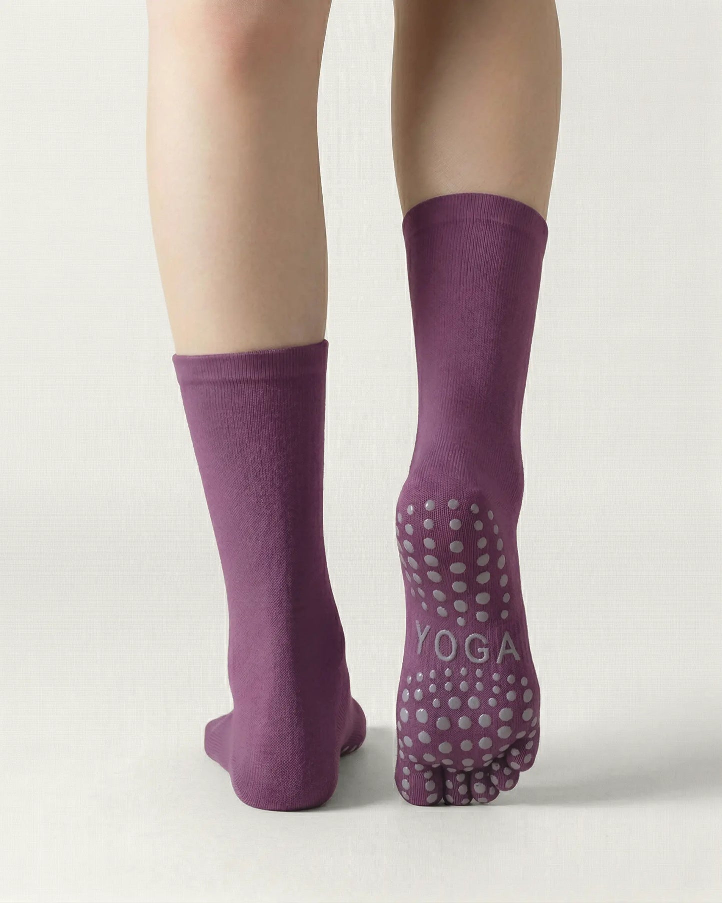 purple | 02 | Purple minimal five-toe grip socks back view showing sole grip pattern, toe separation, and clean silhouette