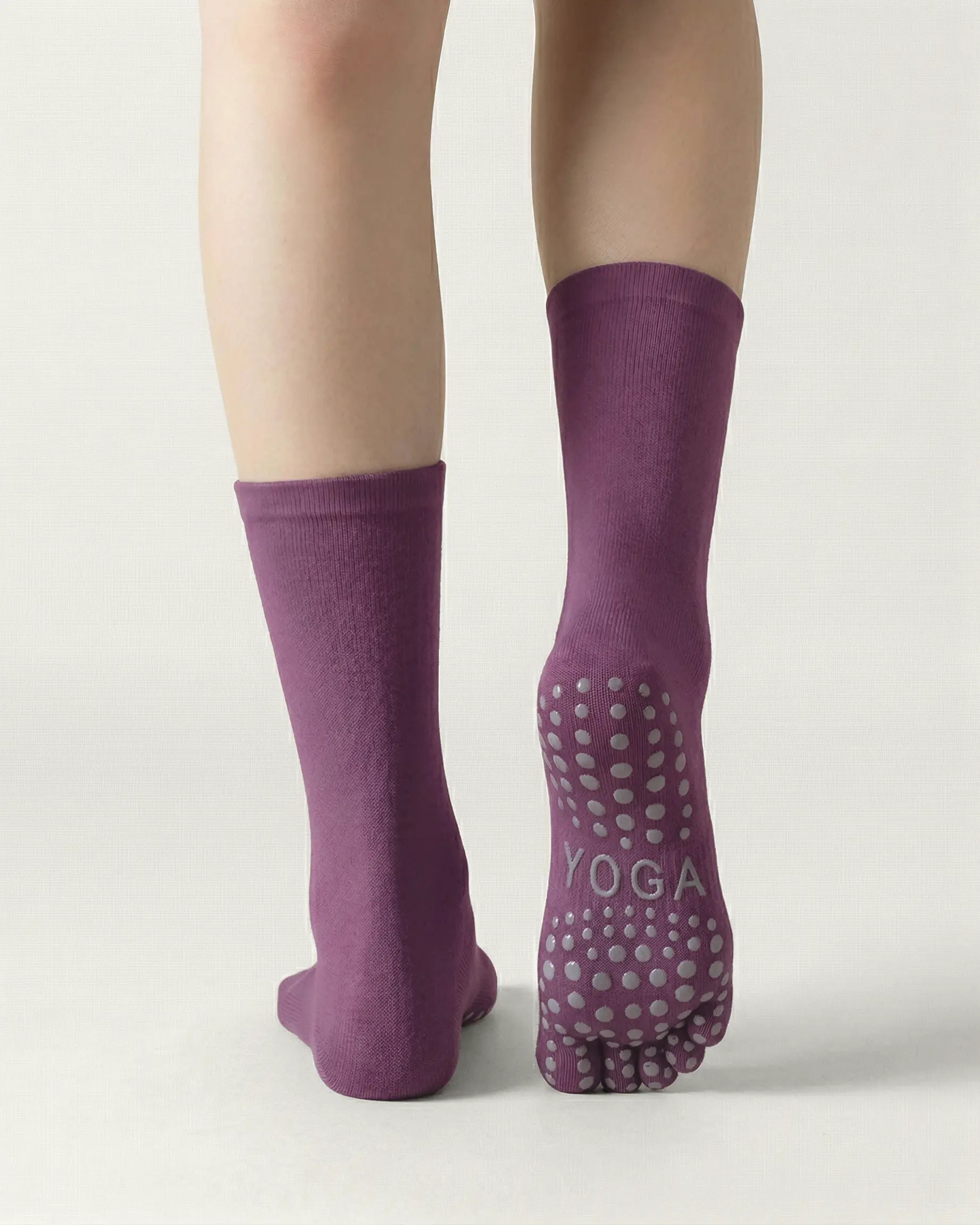 purple | 02 | Purple minimal five-toe grip socks back view showing sole grip pattern, toe separation, and clean silhouette