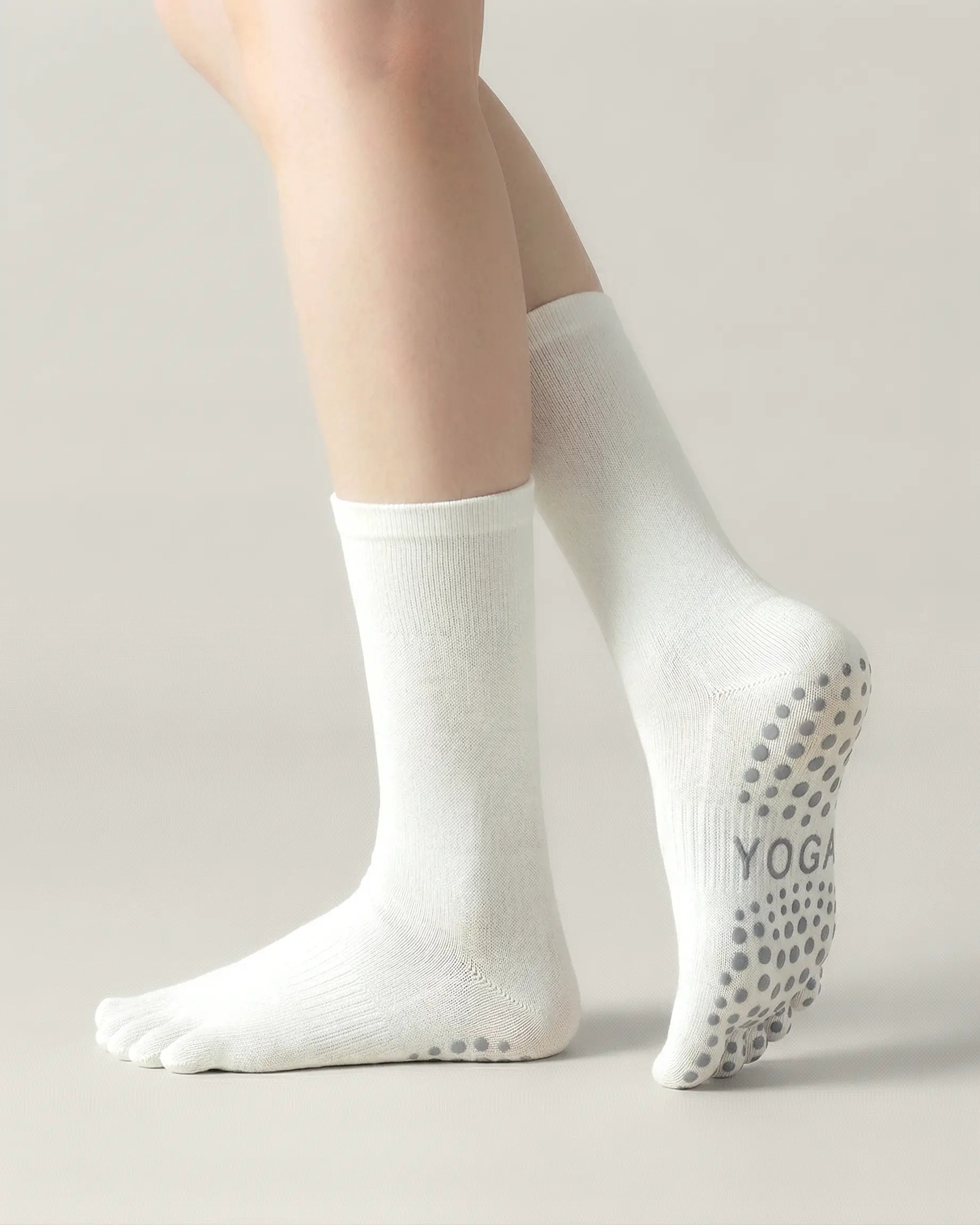 white | 03 | White minimal five-toe grip socks side standing view showing clean texture, toe separation, and overall fit