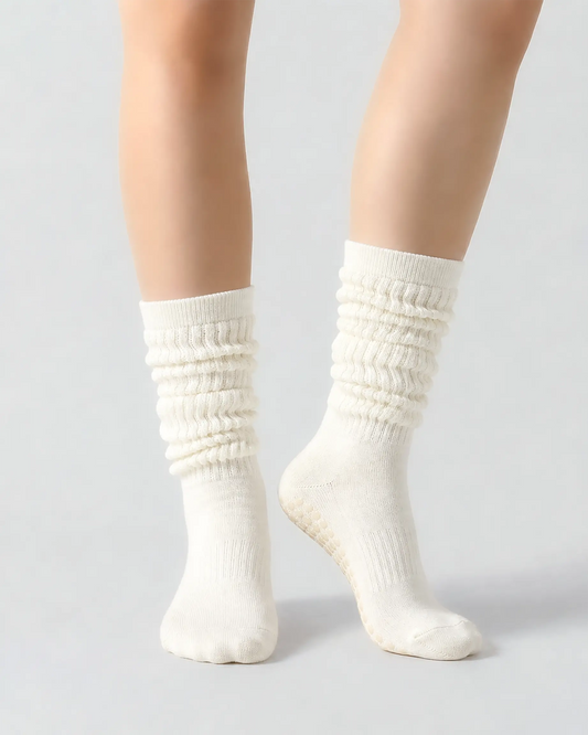 white | 04 | White slouch grip socks front standing view showing crew height, relaxed slouch silhouette, and clean non-slip studio sock styling