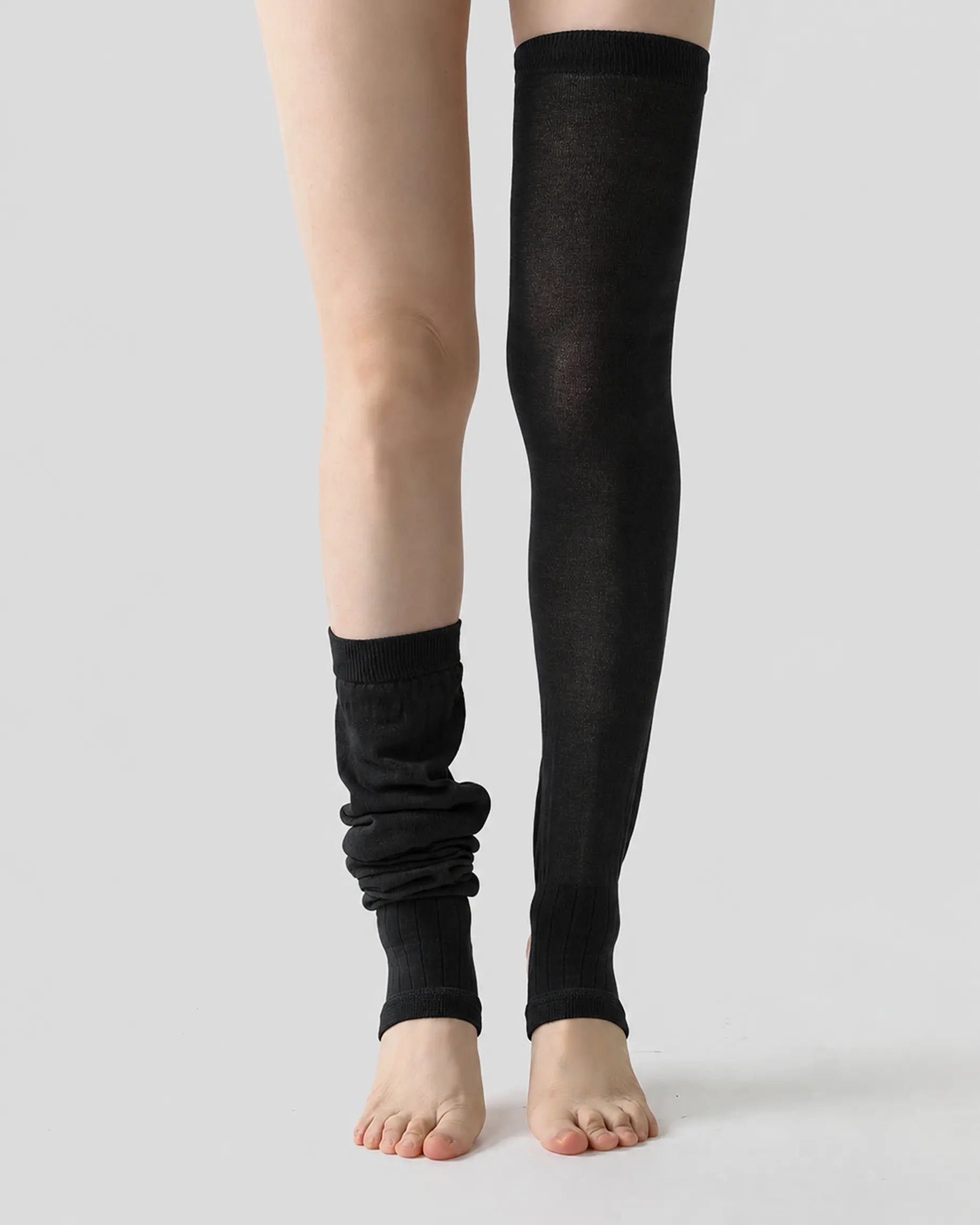 black | 02 | Black ballet stirrup leg warmers styling comparison showing one leg worn fully extended and the other softly scrunched