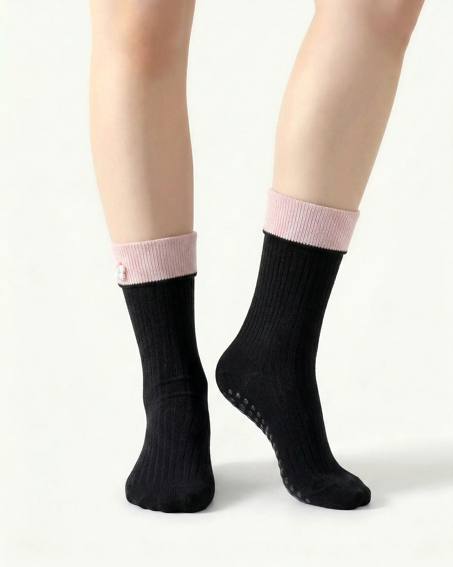 black | 04 | Black floral detail crew grip socks front standing view showing clean crew shape, contrast cuff, and minimal non-slip sock styling